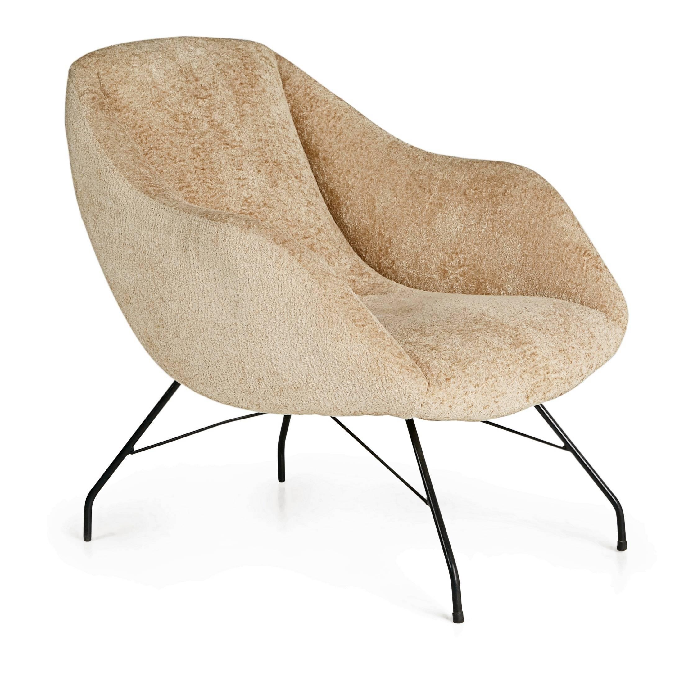 Recently imported from a private collector in Brazil, this arm chair by Martin Eisler and Carlo Hauner for Forma, Brazil, encapsulates the quality and innovation of their designs. This elegant scoop chair with its slightly reclined back retains the