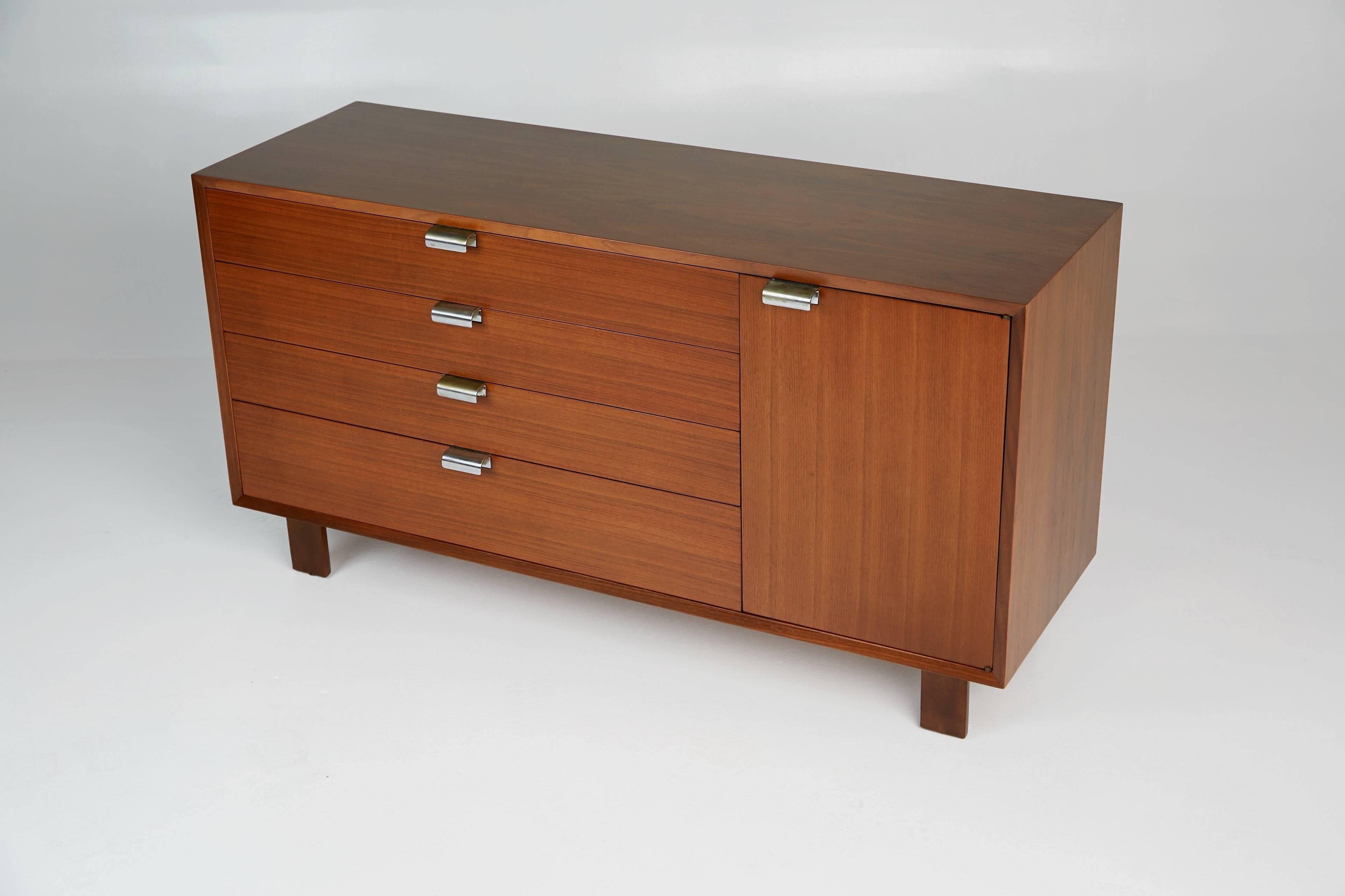 *NOTE* For all items from this dealer, please click VIEW ALL FROM SELLER below on this page.

Designed by George Nelson, this dresser or credenza was part of Herman Miller's collection of modular basic storage components. This cabinet has been newly