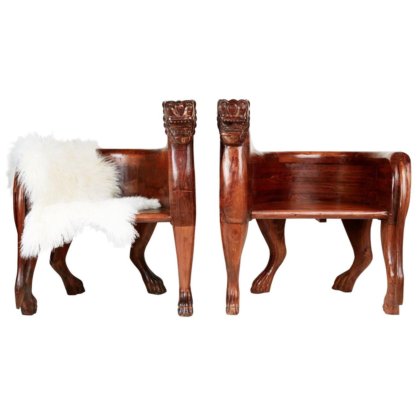 A spectacular and unique find, this pair of figural carved teak Lioness chairs is front-cover-magazine-worthy and can add a bit of the unexpected to any style of room. Consider using at the ends of a long dining table, in a living room or den, next