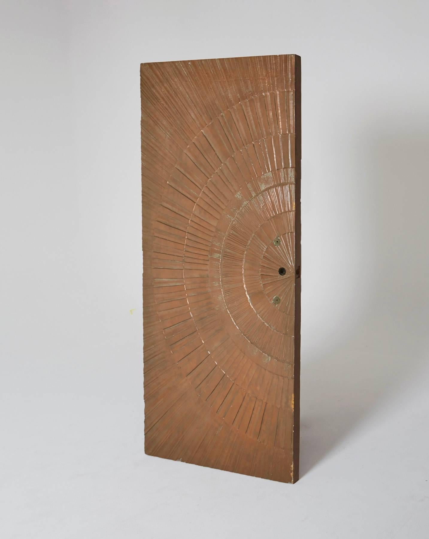 A wildly amazing Mid-Century Modern door by Sherrill Broudy for forms and surfaces, circa 1960, a grandiose bonded and poured bronze door in an abstract Sunburst design. Monumental and stunning, this item comes from deadstock and has never been