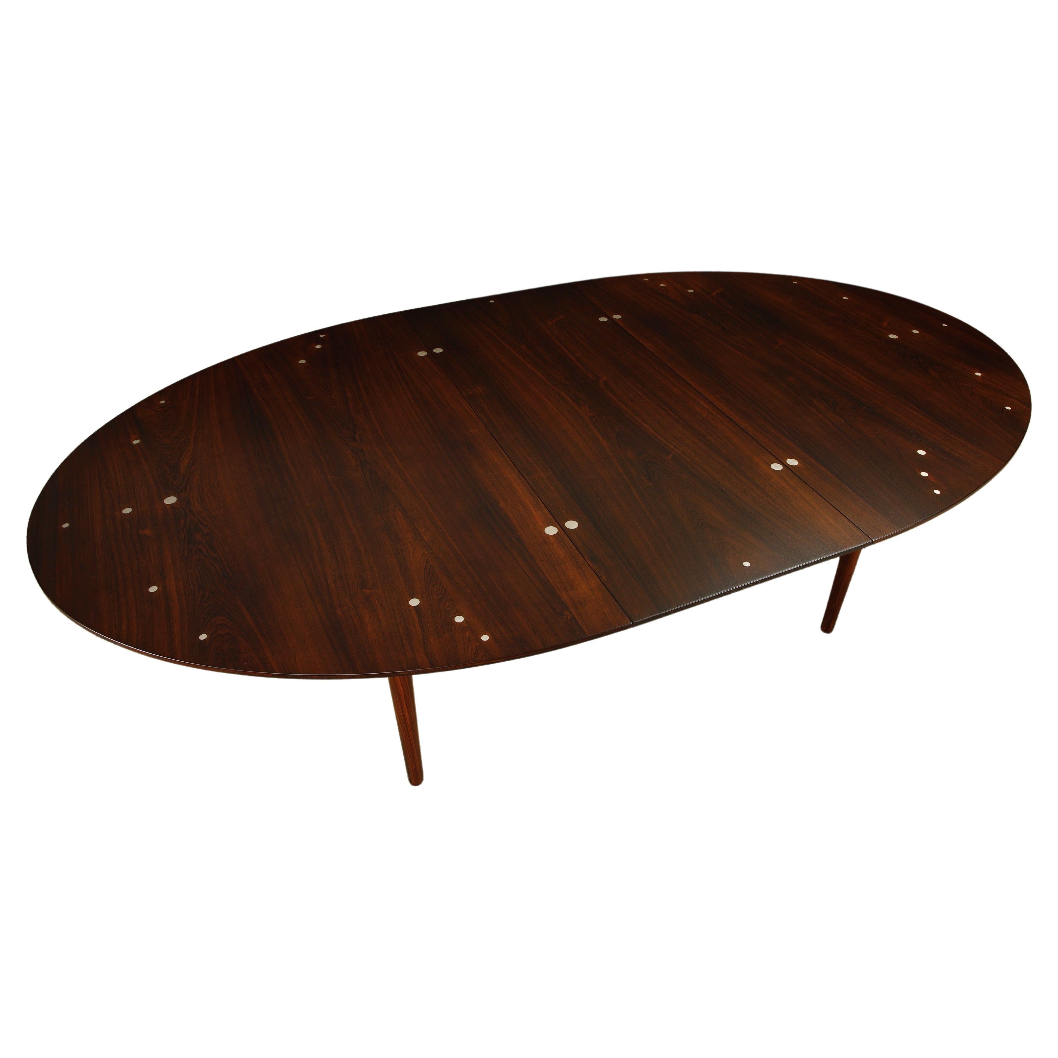 Mesa de comedor Finn Juhl "Judas" de palisandro y plata de ley, c. 1950, firmada