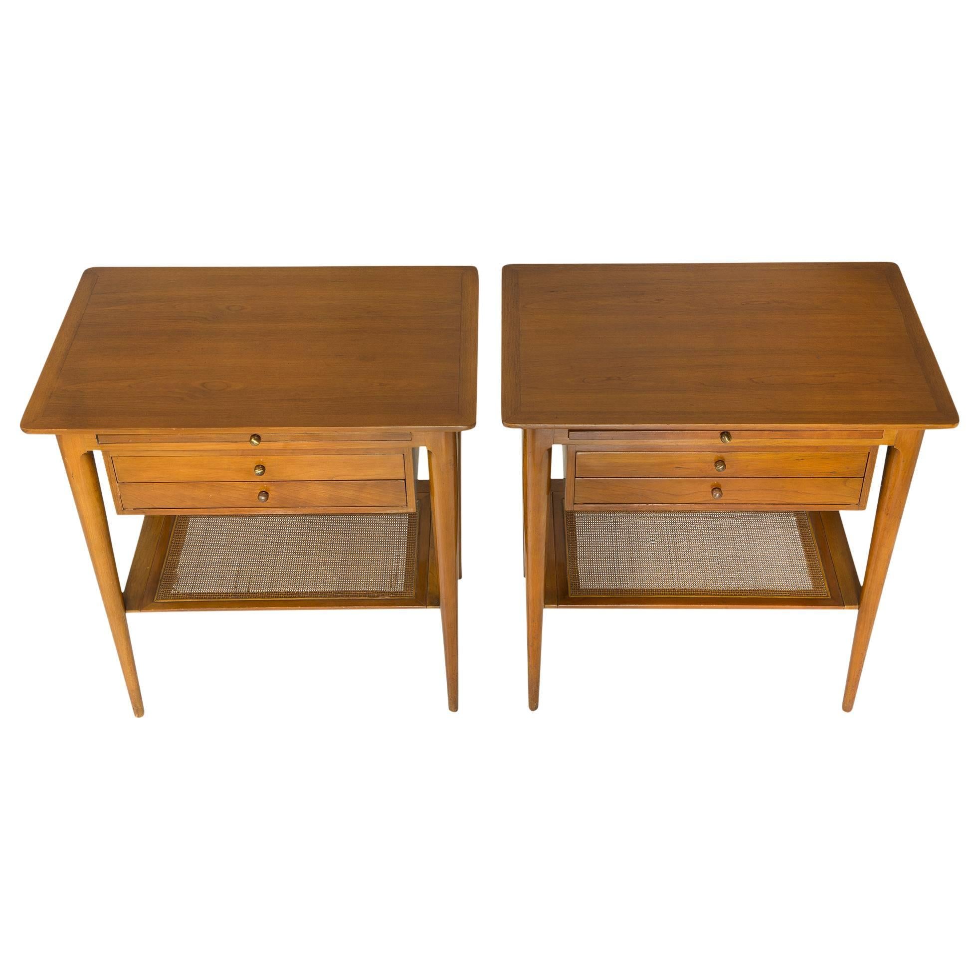 Pair of gorgeous John Widdicomb cherrywood side table nightstands. Two small drawers and a pull-out tray with a removable woven shelf piece on the bottom. These are truly beautiful.

