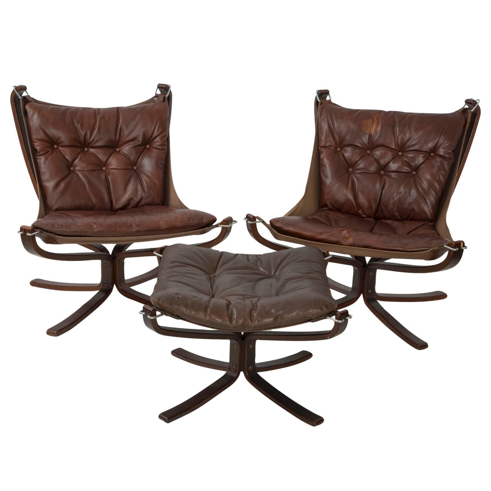 Pair of Sigurd Ressell Leather Falcon Chairs and Ottoman