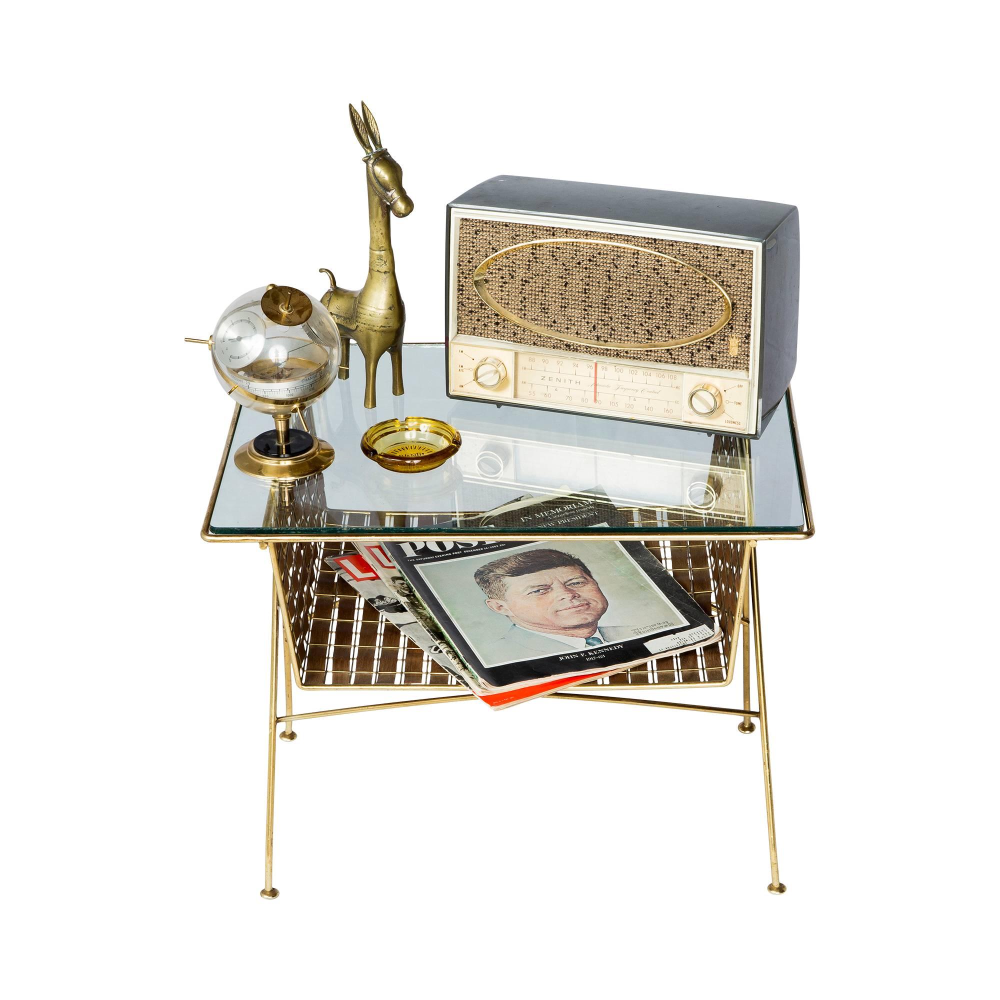 The original advertisement for this item reads: 

"Designed by Tony Paul. From Woodlin-Hall comes a dramatic new group of accessories in polished brass interwoven with natural oil finished walnut. Airy in feeling, yet rich in materials and