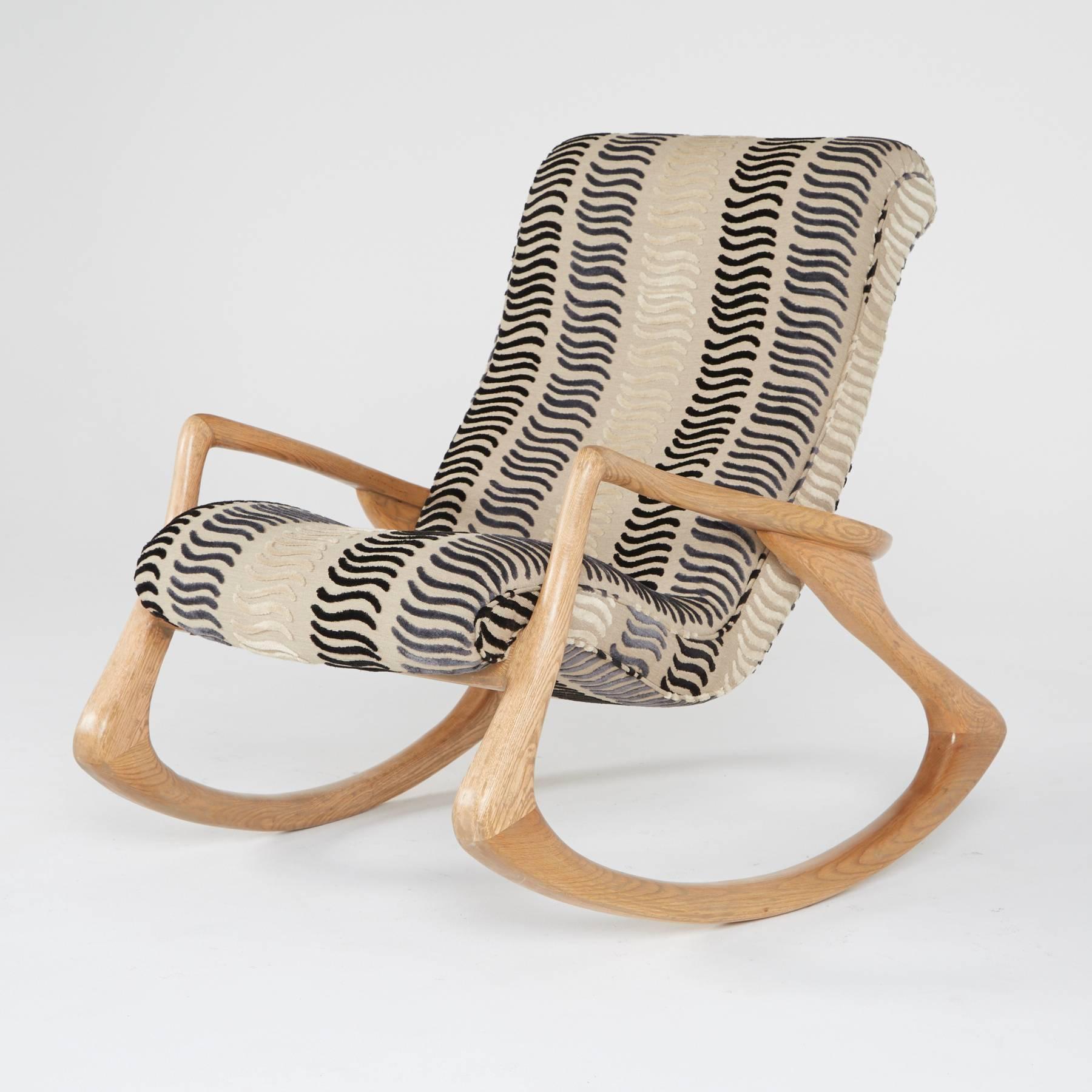 A very rare example in oak, this Vladimir Kagan contour rocker is as collectible as it is beautiful and a fine choice as an investment for collectors and an heirloom for generations. 

Lounge with a book, soak in a view, watch your favorite show.