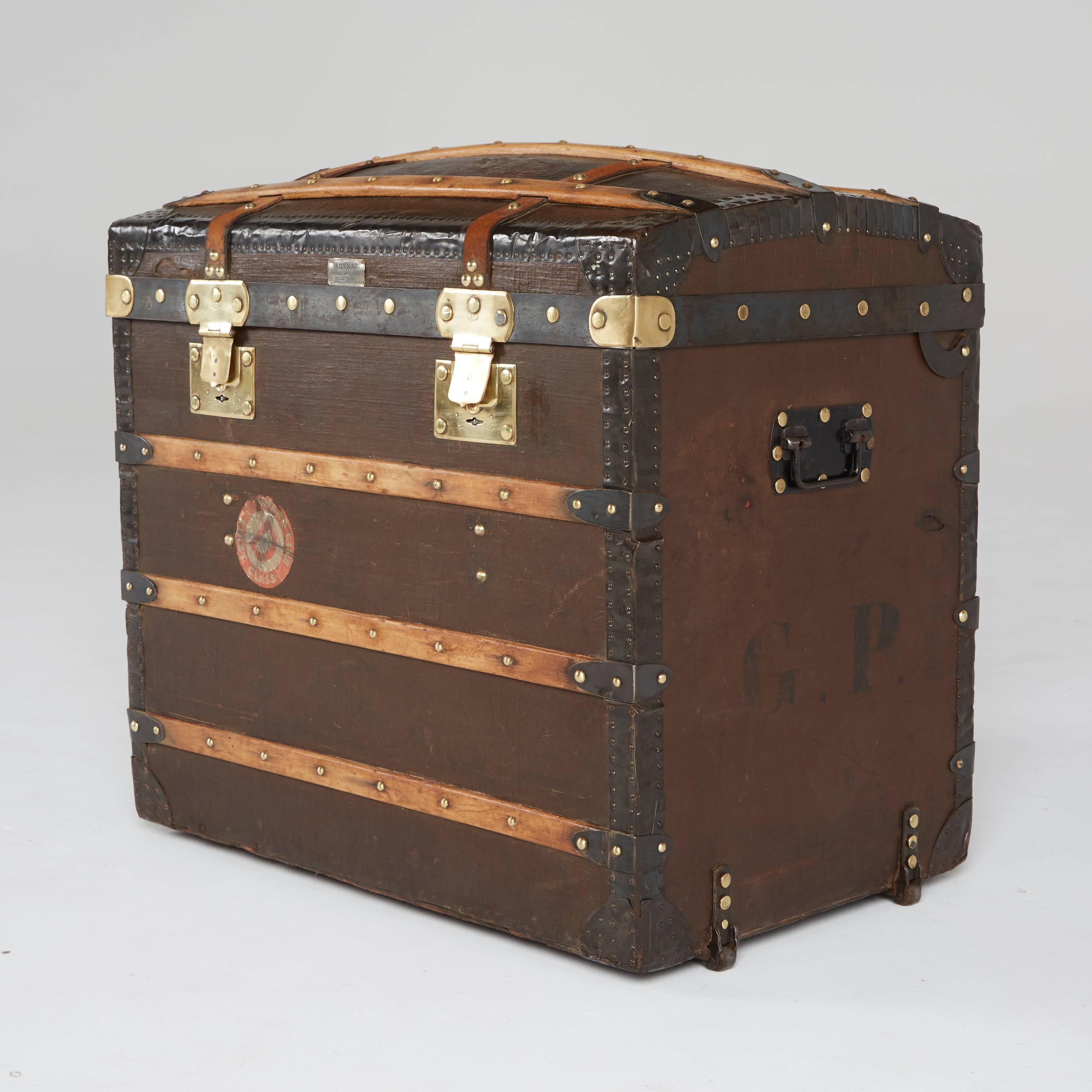 This classic steamer trunk is a fine display of luxury by the oldest French trunk maker, Moynat. Recently restored by a specialized trunk restoration expert, this fine example of history is now ready to be placed into a luxurious setting.

Adorning