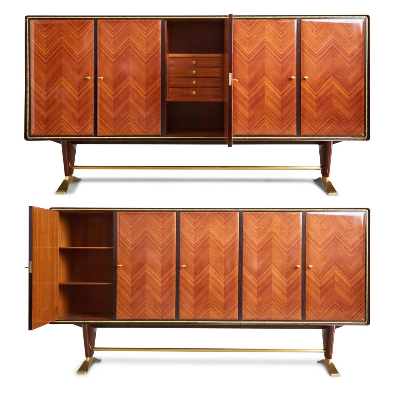 Magnificent Paolo Buffa, attributed, art deco buffet cabinet featuring Italian rosewood parquetry in a chevron pattern with a beautiful french polish and impressive bronze accents with lockable doors complete with five (5) keys. The interior is