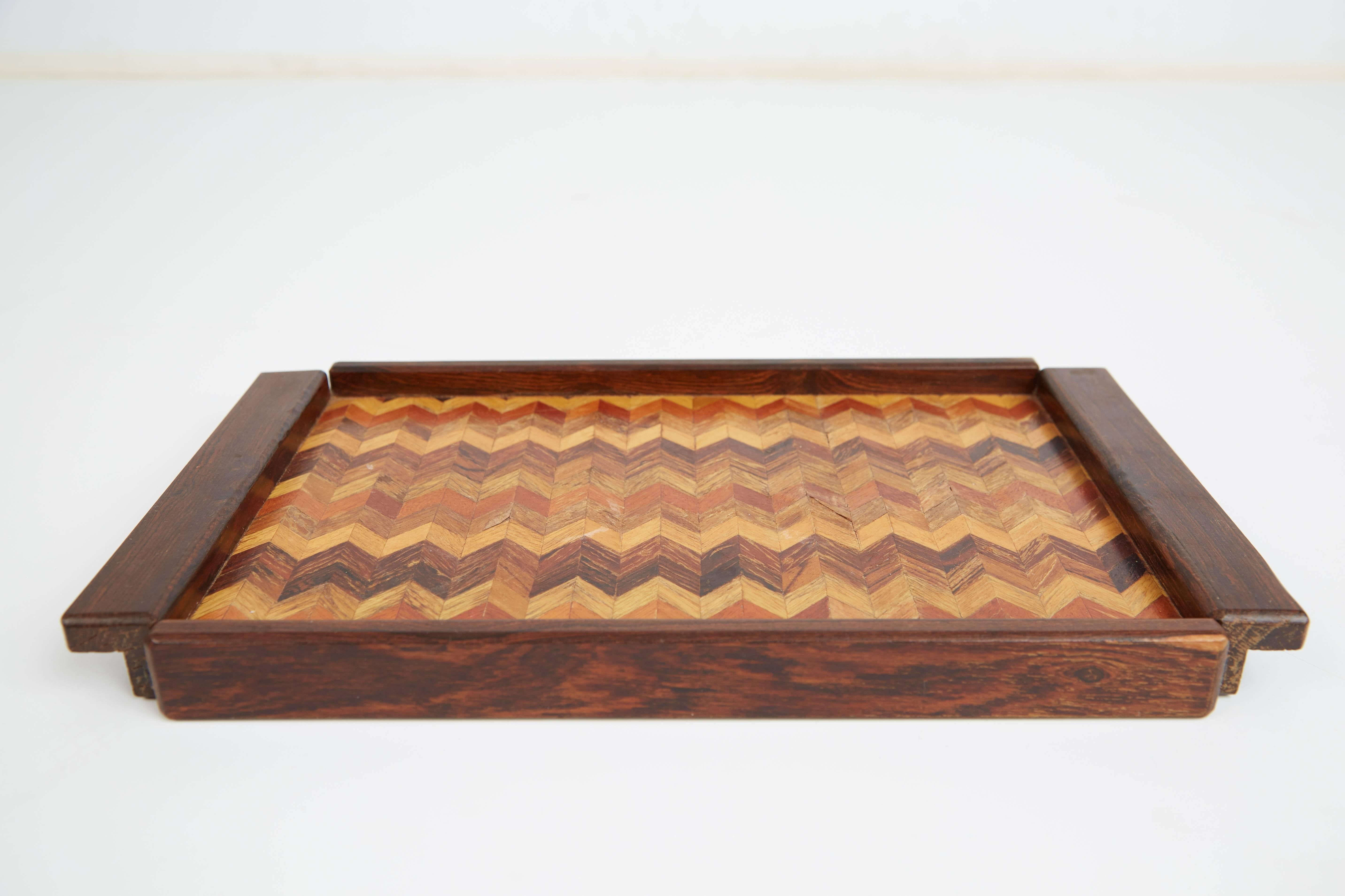 Exquisitely crafted rectangular shaped trays designed by Don Shoemaker for Señal of Mexico. Taking advantage of the expertise provided by Mexican artisans, Shoemaker founded Señal which produced utilitarian objects, such as these stunning