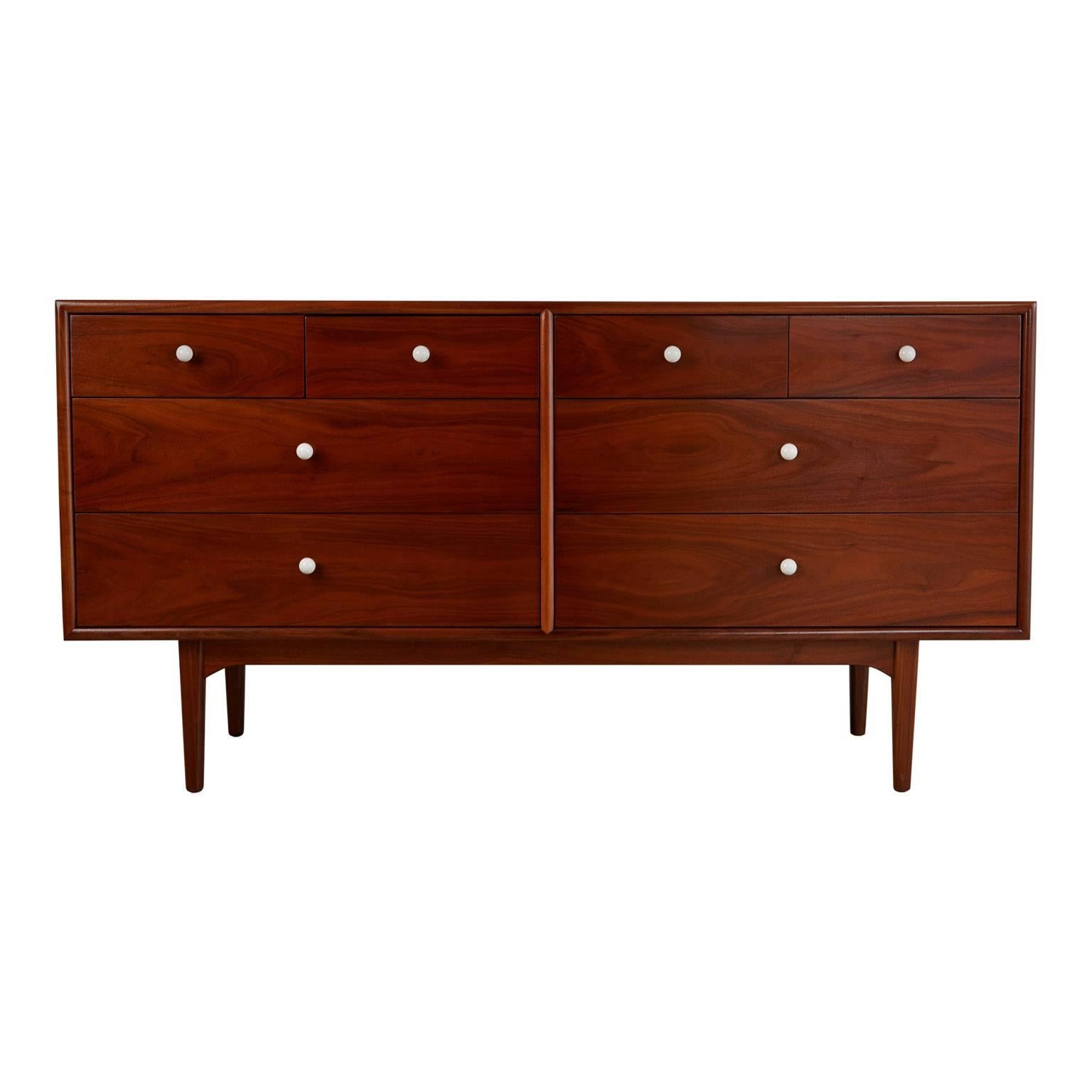 Exceptional Mid-Century Modern bedroom set designed by Kipp Stewart and Stewart McDougall as part of the Declaration line for Drexel furniture. This set consists of two nightstands or side tables, one highboy with flip-top vanity and one credenza.