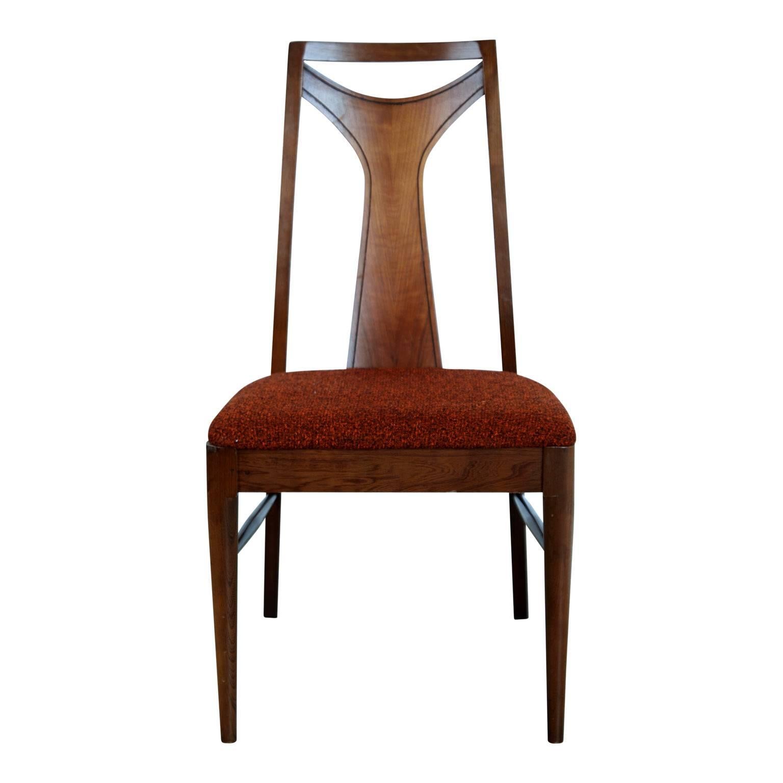 Excellent candidate for reupholstery, this set of dining chairs from the Saga collection by Broyhill and often attributed to the Brasilia collection by Oscar Niemeyer for Broyhill Premiere. This set of six (6) chairs includes four (4) side chairs