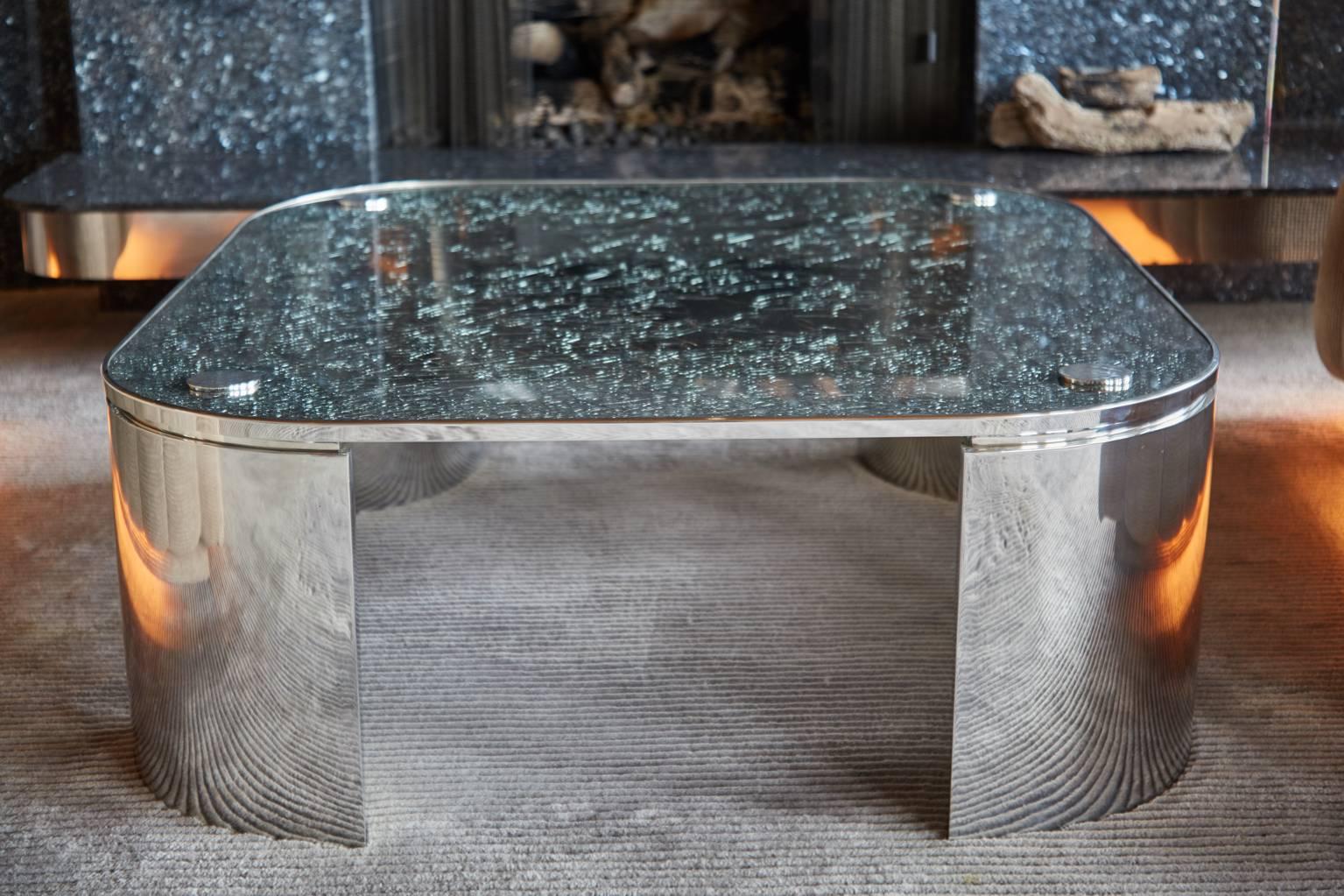 Invest in a piece of design history with this square crackle glass coffee table with rounded corners by Steve Chase. Recently procured from an extraordinary coastal cliff top home in Laguna Beach which was custom designed in it's entirety by