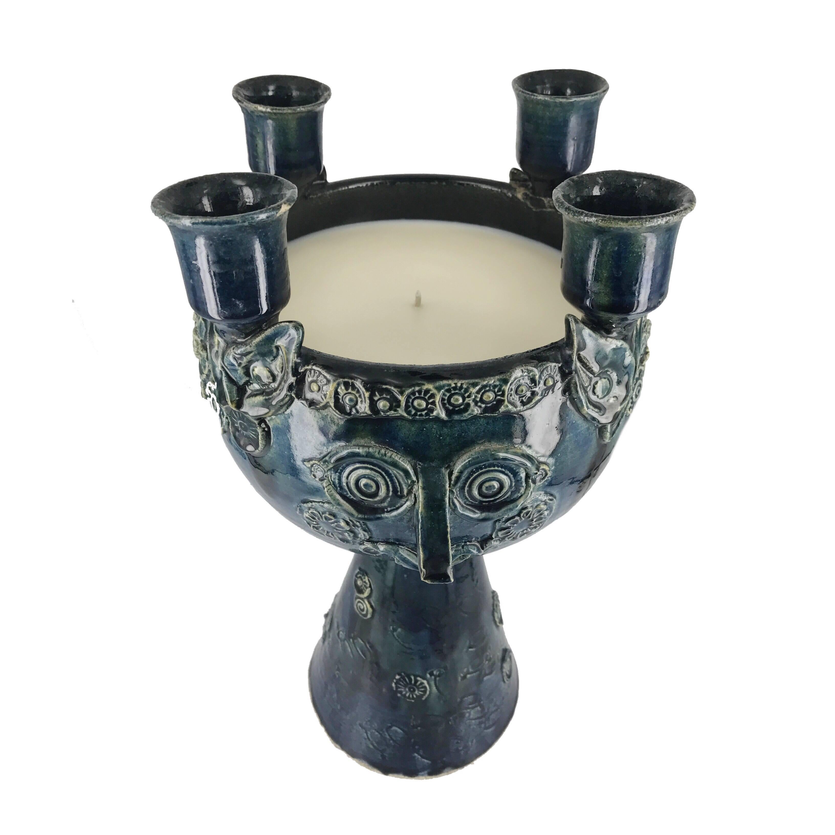 Beautiful glazed ceramic candelabra by renowned Danish artist Bjorn Wiinblad. Featuring four candle holders surrounding one central vessel that contains a hand poured custom-made soy candle by Venice Beach Candle Company. A custom fragrance was