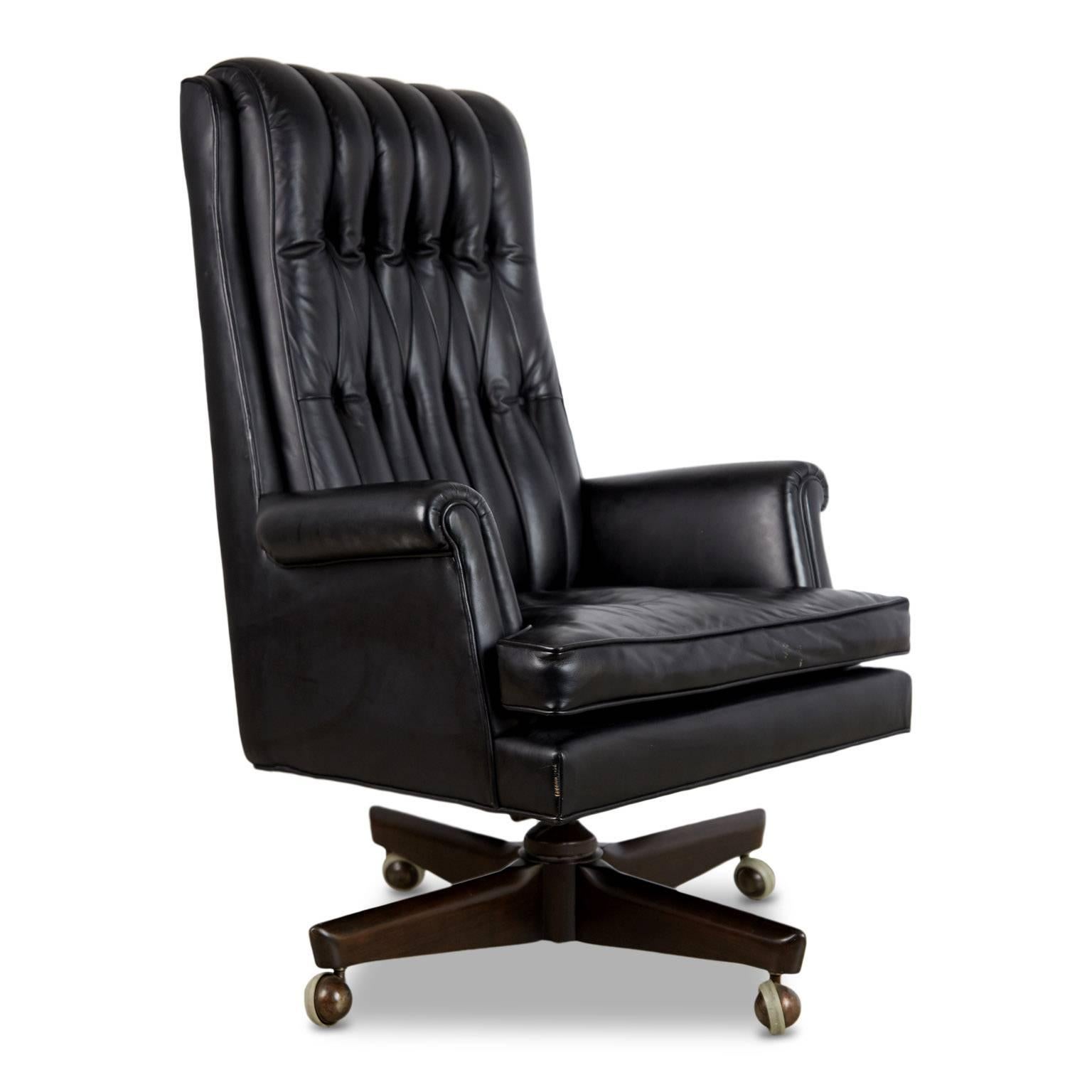 Grand scaled leather executive desk chair by Maurice Bailey for Monteverdi-Young. Renown for their application of the Italian modernist movement in their designs, Monteverdi-Young paired this approach with old-fashioned craftsmanship, both of which