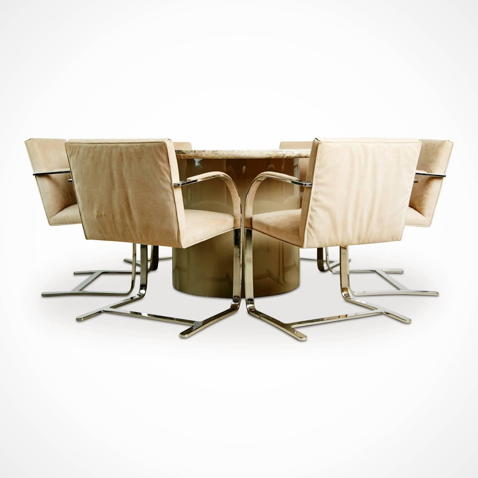 This pairing of six (6) chrome flat bar dining chairs by Brueton and a commanding 60