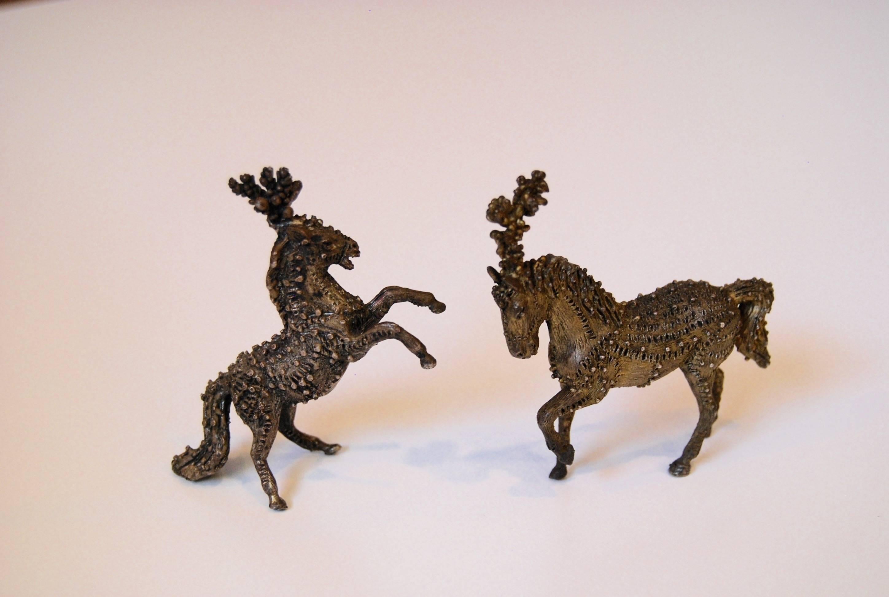 A Pair of miniature highly detailed circus horses from Sascha Brastoff's personal collection. These may have been prototypes for horse statues he created for The Franklin MInt.