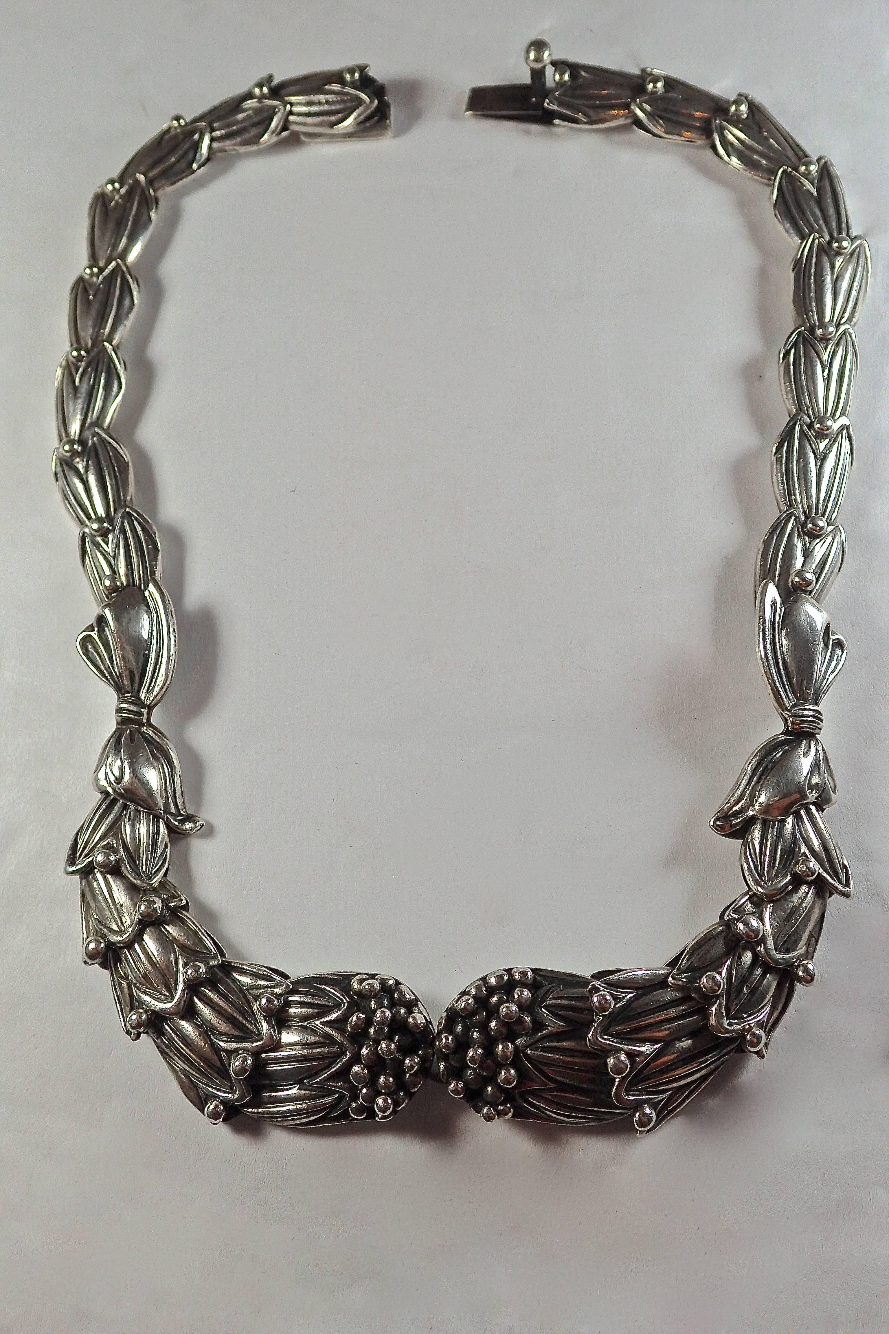 Mexican Sterling Silver 
Beautifully detailed and handcrafted hinged cuff and riveted necklace. Each of the three pieces are signed for authenticity and remain in excellent condition. 
Necklace length: 15.5 inches
Bracelet cuff: 6.5 x 2.5