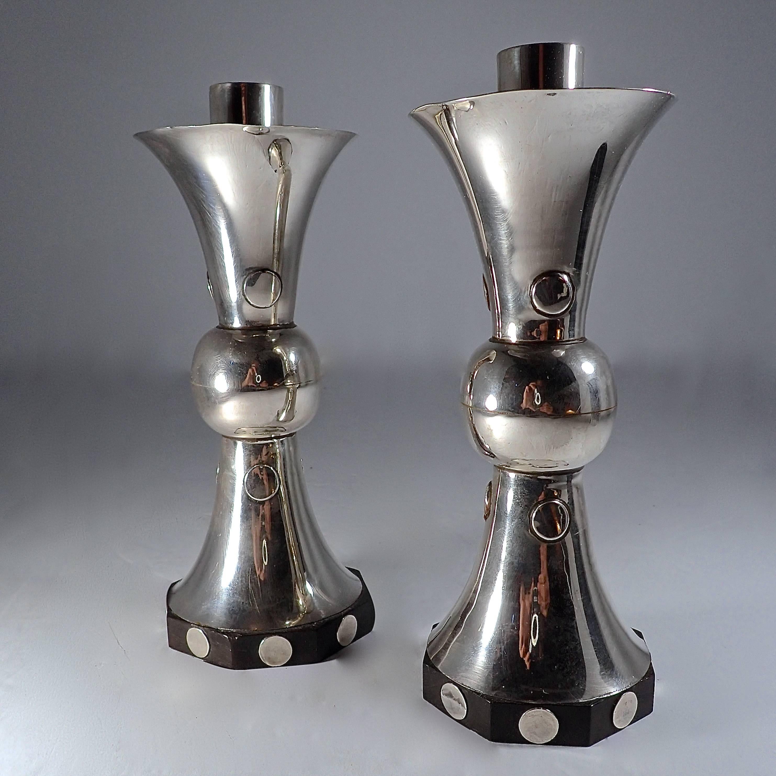 Sterling Silver candlesticks with wooden octagonal ebony base; decorated with silver dots. Hourglass profile with silver spheres. Stamped for authenticity. 