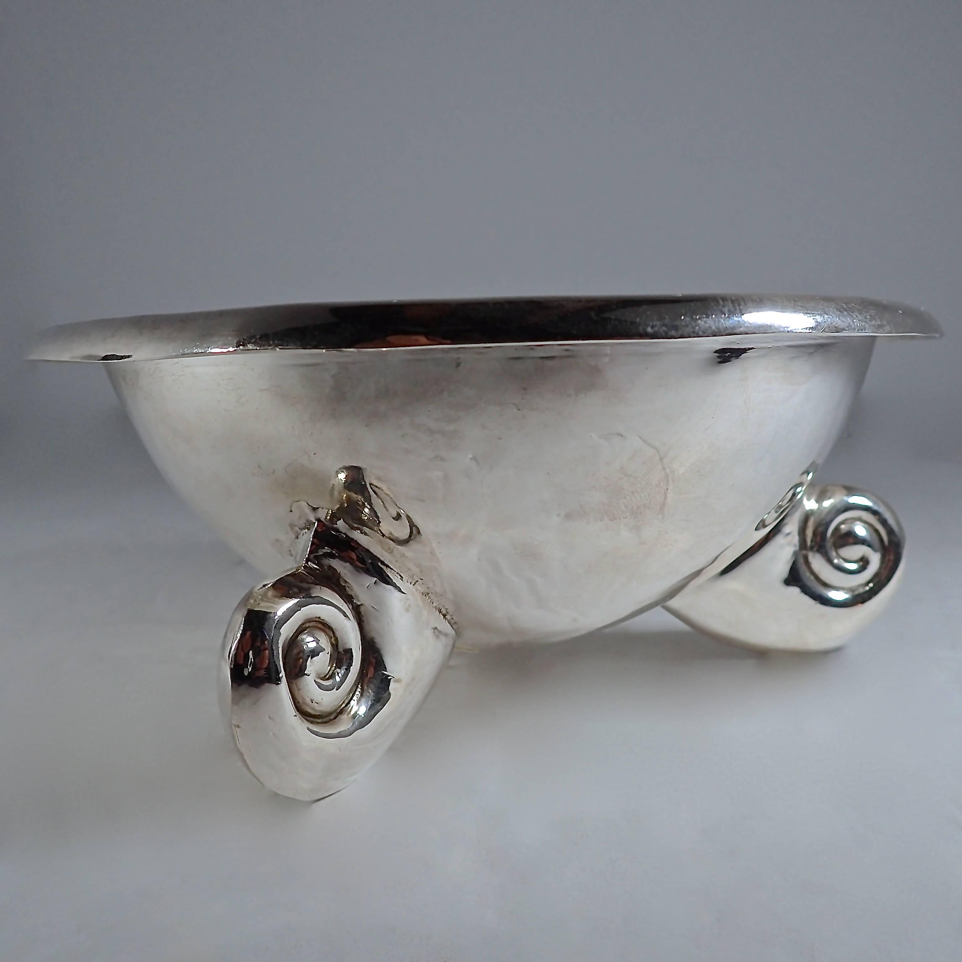 Hand-raised sterling silver footed bowl from Taxco, Mexico. Created from a single flat sheet of silver hammered into the desired shape and then polished to a smooth finish. 