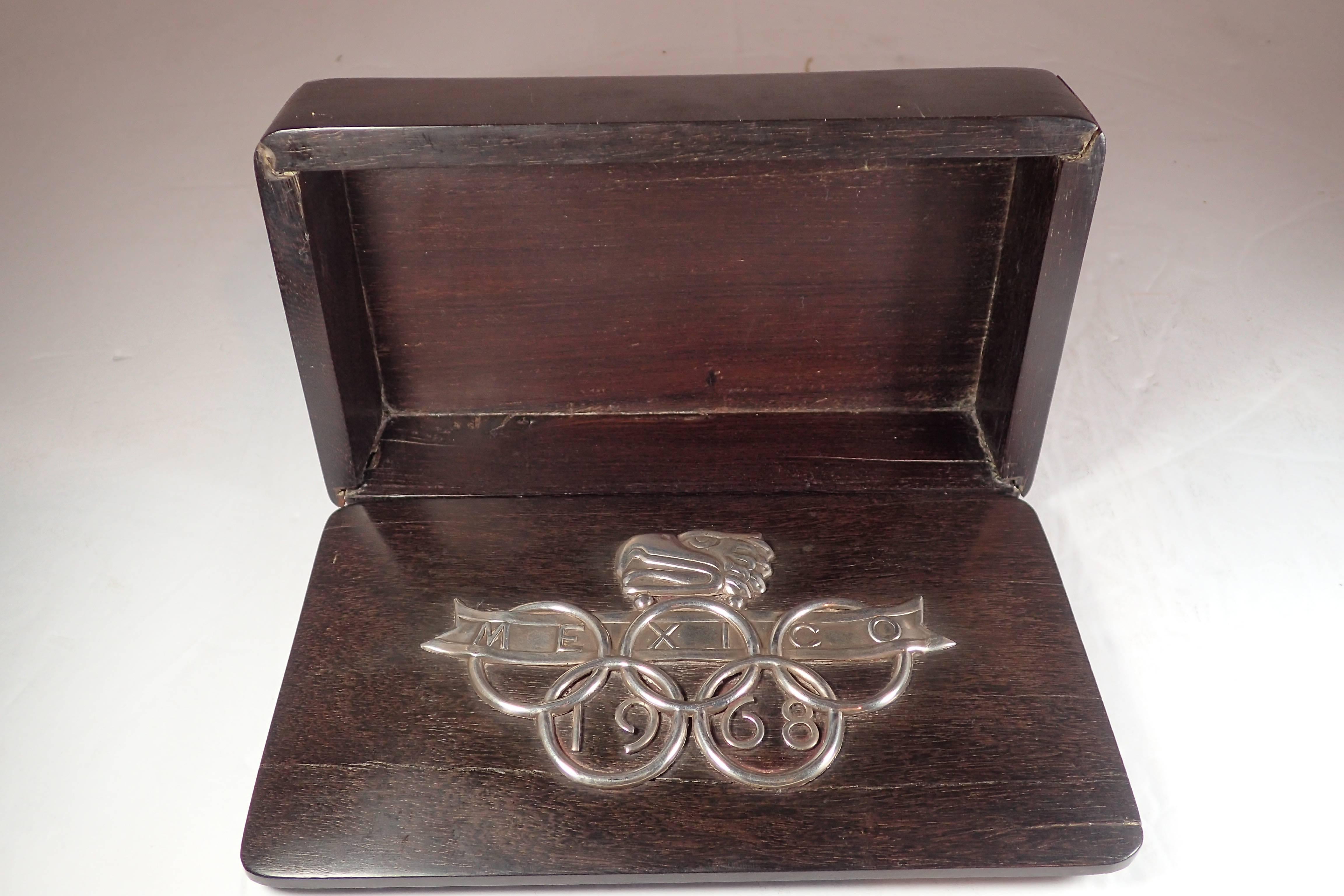 William Spratling 1968 wood and silver box. Cast silver details attached to the removable lid. Negotiable price for distress. Great decorative piece, or for a collection of cigar boxes. 
