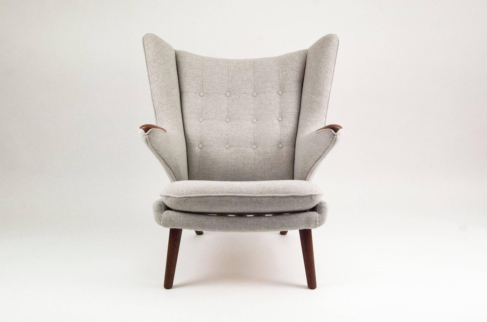 Designed for AP Stolen in 1951, this is possibly Wegner's most iconic design. This model features teak 'paws' and Afromosia legs. The chair has been reupholstered in Kvadrat Tonus Meadow wool fabric.