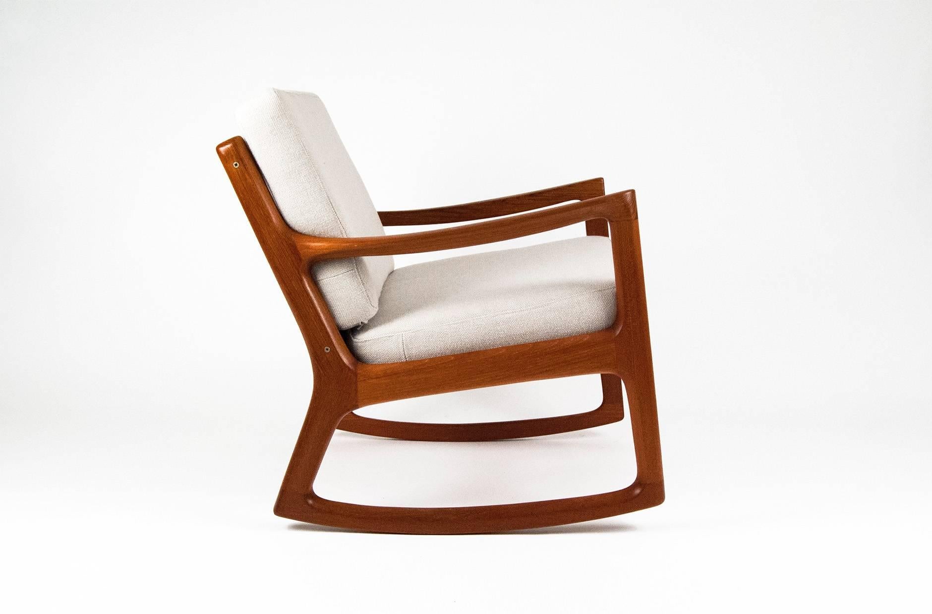 Ole Wanscher 'Senator' rocking chair, circa 1960. Produced by Cado, Denmark. Includes maker's stamp and production number. New cushions covered in Kvadrat Hallingdal No. 103 woven wool fabric. Restored, oiled teakwood.