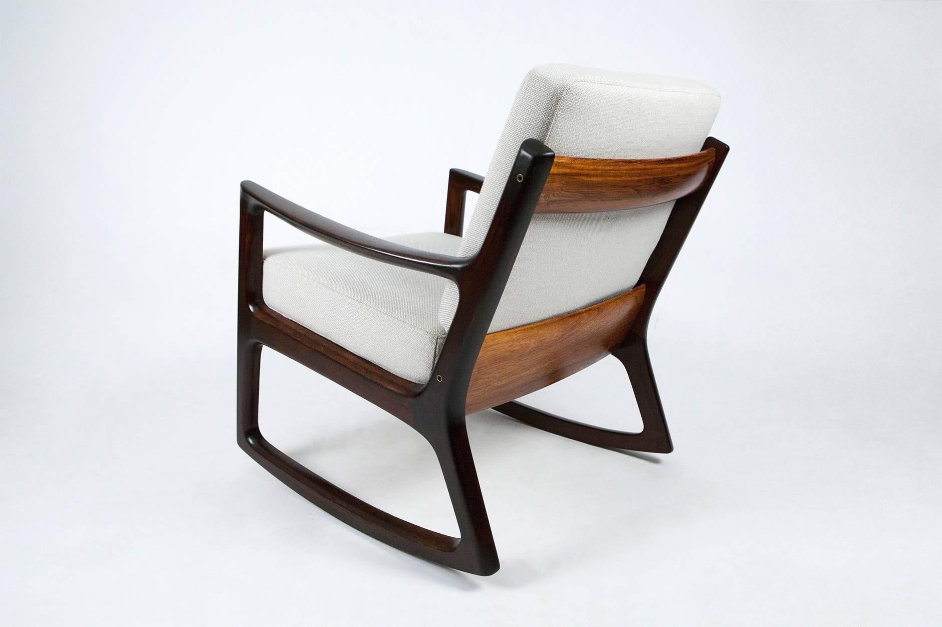 Rare rosewood edition of the 'Senator' rocking chair, circa 1960. Produced by France & Son, Denmark. Solid Brazilian rosewood. Includes maker's stamp and badge. New cushions covered in Kvadrat Hallingdal #103 wool fabric.