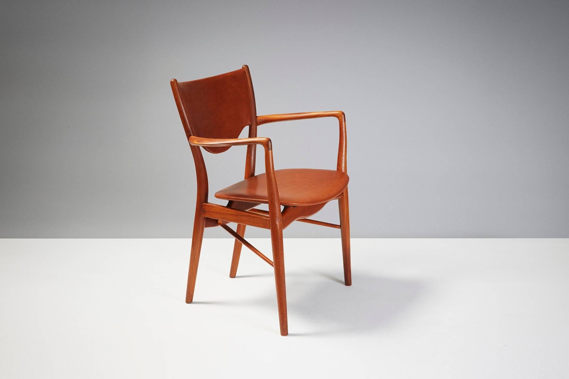 Finn Juhl

BO-76 armchair, 1953

Produced by Bovirke, Denmark. Patinated teak frame, leather seat and back. Minor signs of age, some abrasions on front legs.