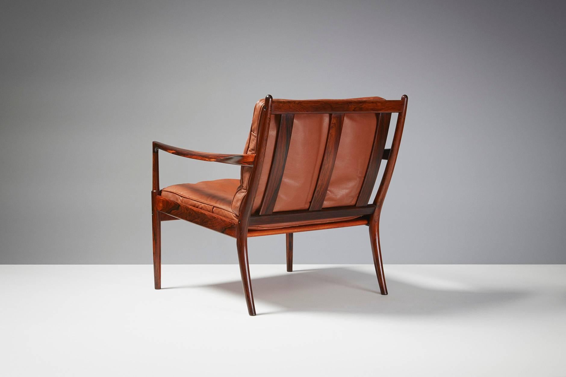 Mid-20th Century Pair of Ib Kofod-Larsen 'Samso' Rosewood Lounge Chairs, circa 1960s