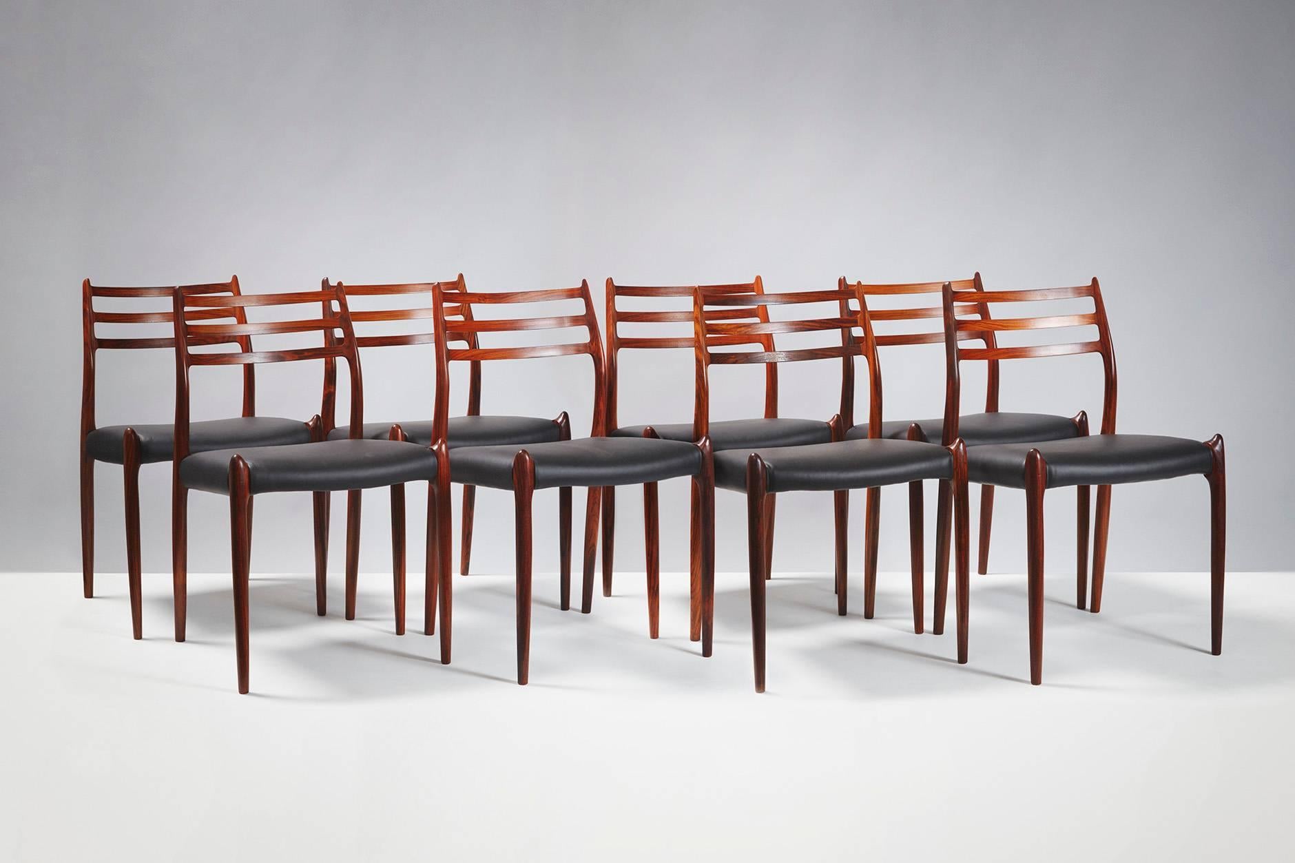 Niels O. Møller

Model 78 dining chairs, 1962

Set of eight rosewood dining chairs designed by Niels O. Møller for J.L. Moller Mobelfabrik, Denmark, 1962. Seats reupholstered with premium black leather.

Larger sets and other upholstery