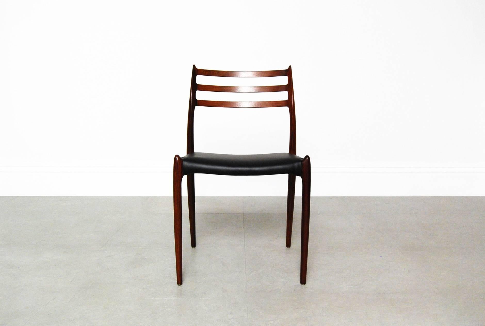 Set of six model 78 dining chairs from Niels Moller in Brazilian rosewood, circa 1965. One of the most iconic and sought after dining chairs from the Danish modern era. Reupholstered in new black leather.