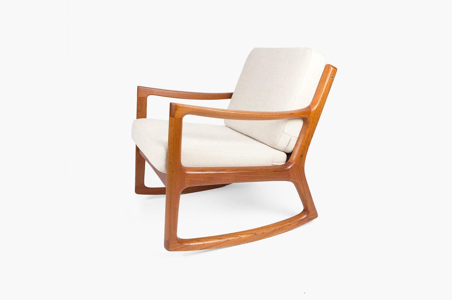 Solid teak rocking chair produced by France & Son, circa 1960, Denmark. Includes maker's badge. New cushions covered in Kvadrat Hallingdal No. 200 woven wool fabric.