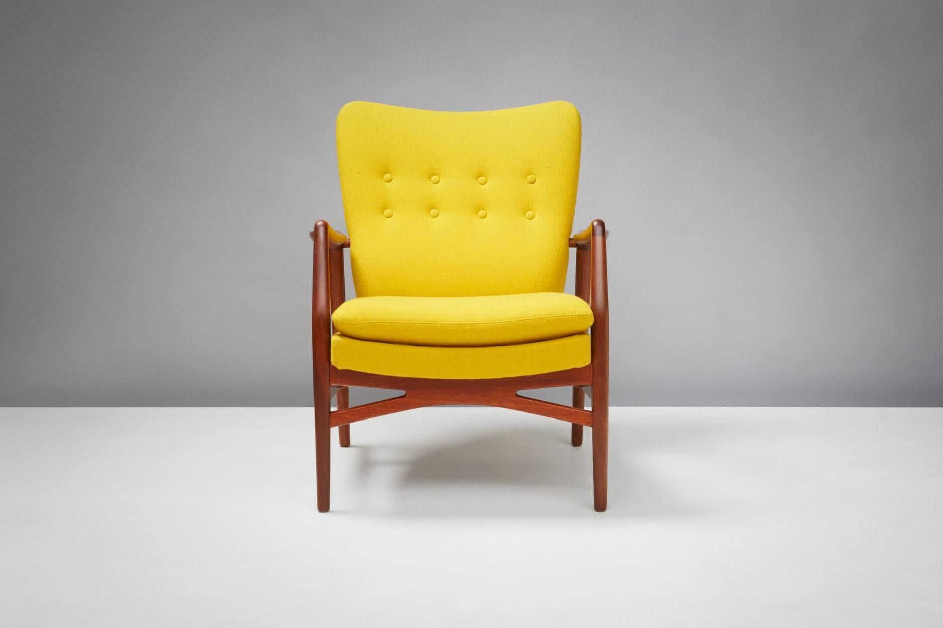 Produced by Slagelse Mobelvaerk, Denmark. Teak frame, seat reupholstered in yellow Kvadrat Halingdal fabric.