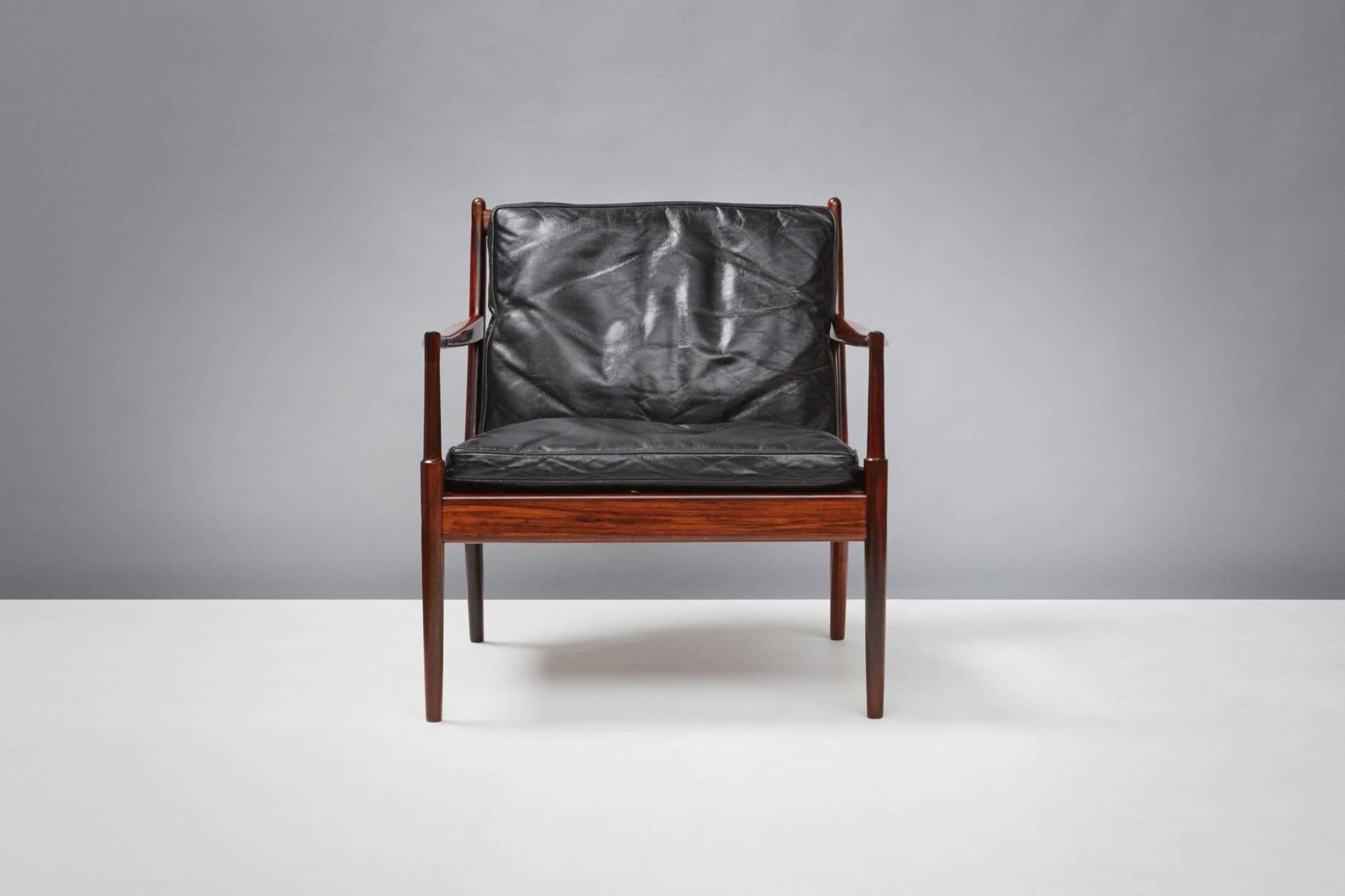Ib Kofod-Larsen

'Samso' lounge chair, circa 1960

Rare model lounge chair produced for Olof Perssons Fatoljindustri (OPE), Jonkoping, Sweden. Original leather cushions with beautifully figured rosewood frame. 

 