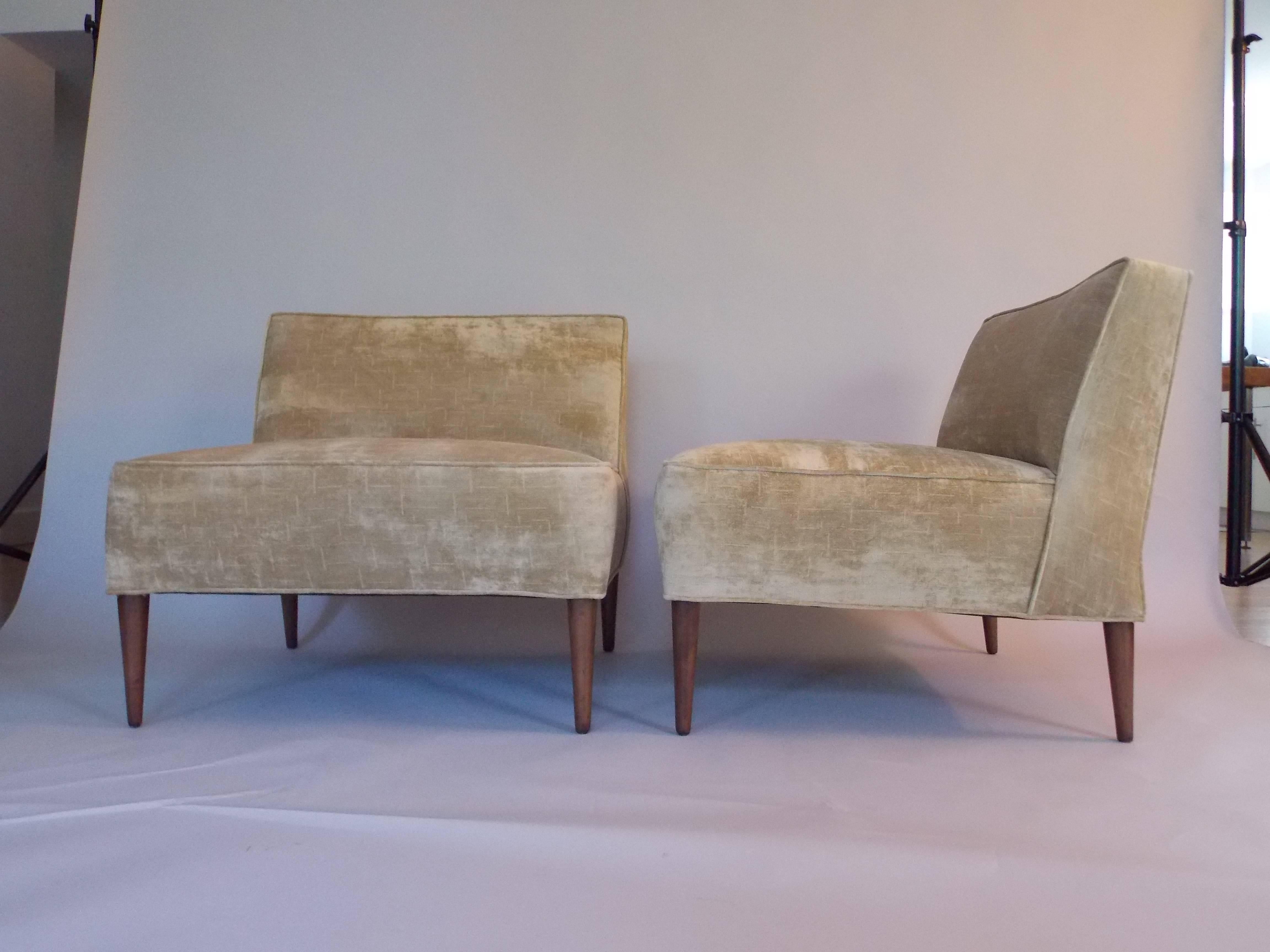 A rare pair of lounge chairs.
Quality made, timeless designs.
These came from an old estate in Pasadena California. 
They were probably a custom design or sold through the Barker Brothers store or from Glenn of California.
They've been restored with