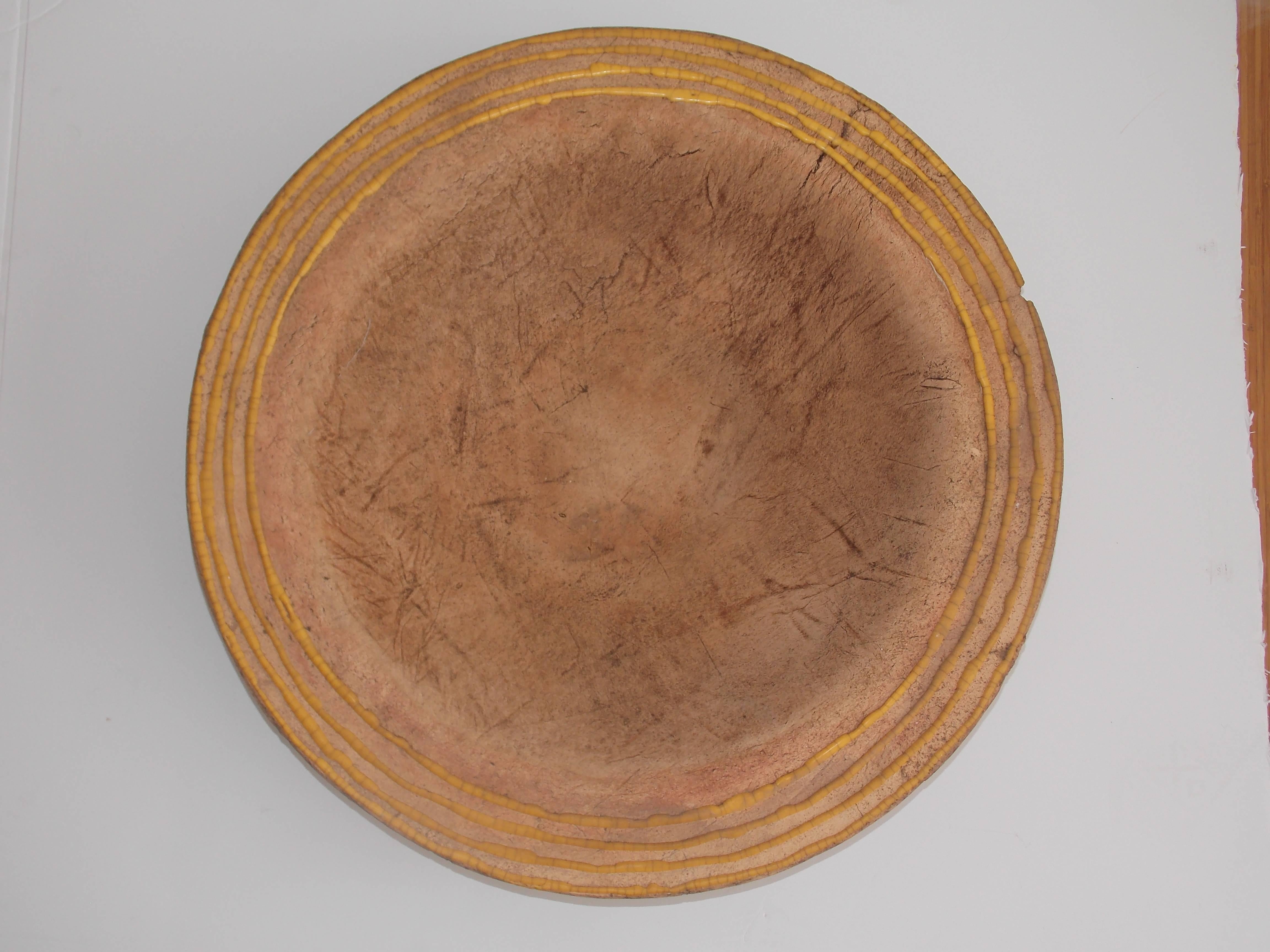 1887-1967.
Mr. Lukens taught at the University of Southern California.
His work was a major influence in the modern pottery design aesthetic, which paved the way for ceramics today. 
This piece is a wheel thrown bowl with natural earthy clay and
