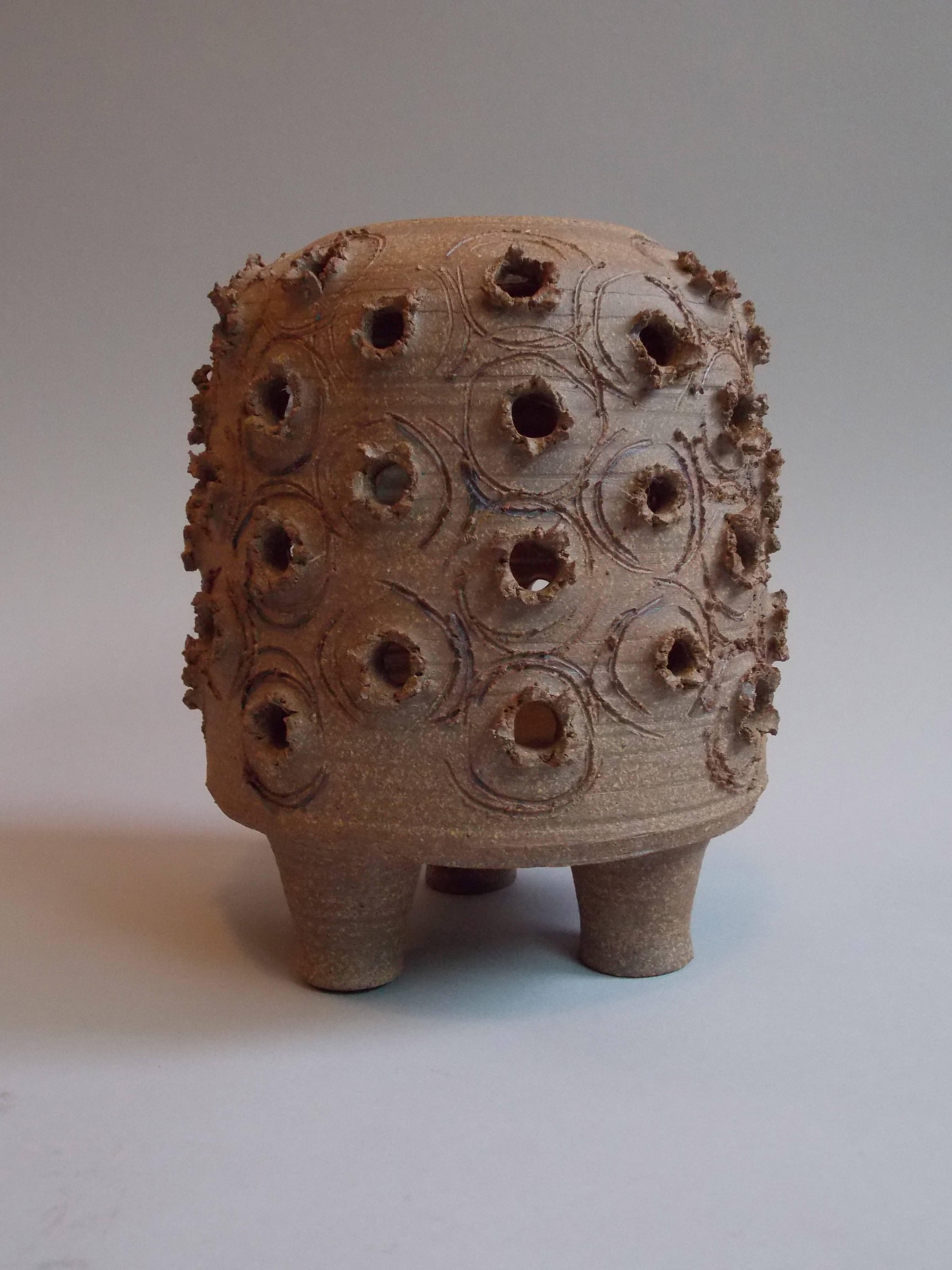 Pro Artisan / Studio Pottery / California Design.
One-of-a-kind.
Wheel thrown high fired stoneware form.
Made with Cressey's formula clay and hand pierced with carved pattern design for candle or electric light to stream through.
No chips, cracks or