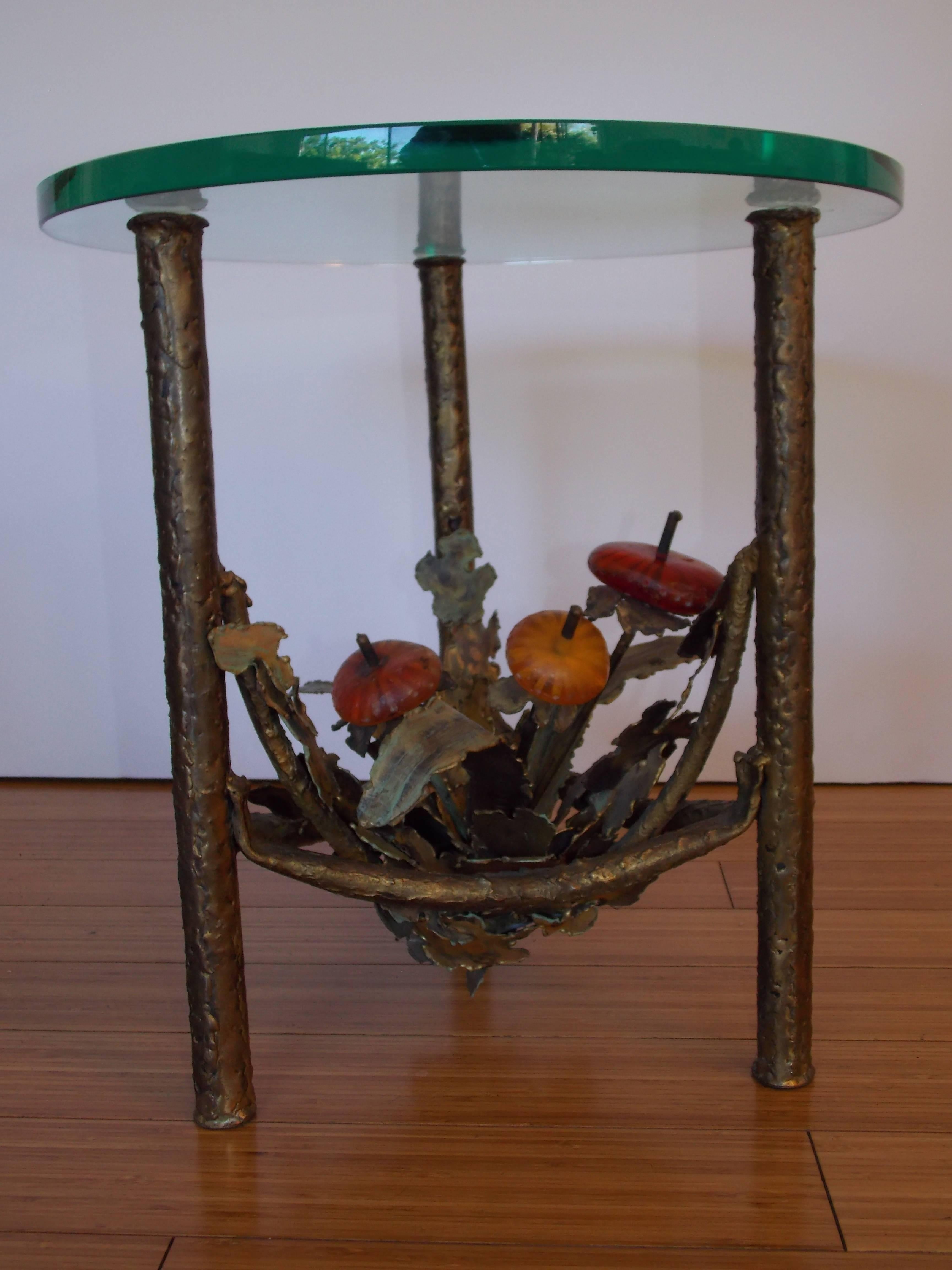 A fun design for any interior.
Made of torch cut bronze plant forms with resin bulbs detailing and bronze-plated steel base with original glass top (faint scratch) no chips.
In great used / vintage condition.
No damage or repairs.

 