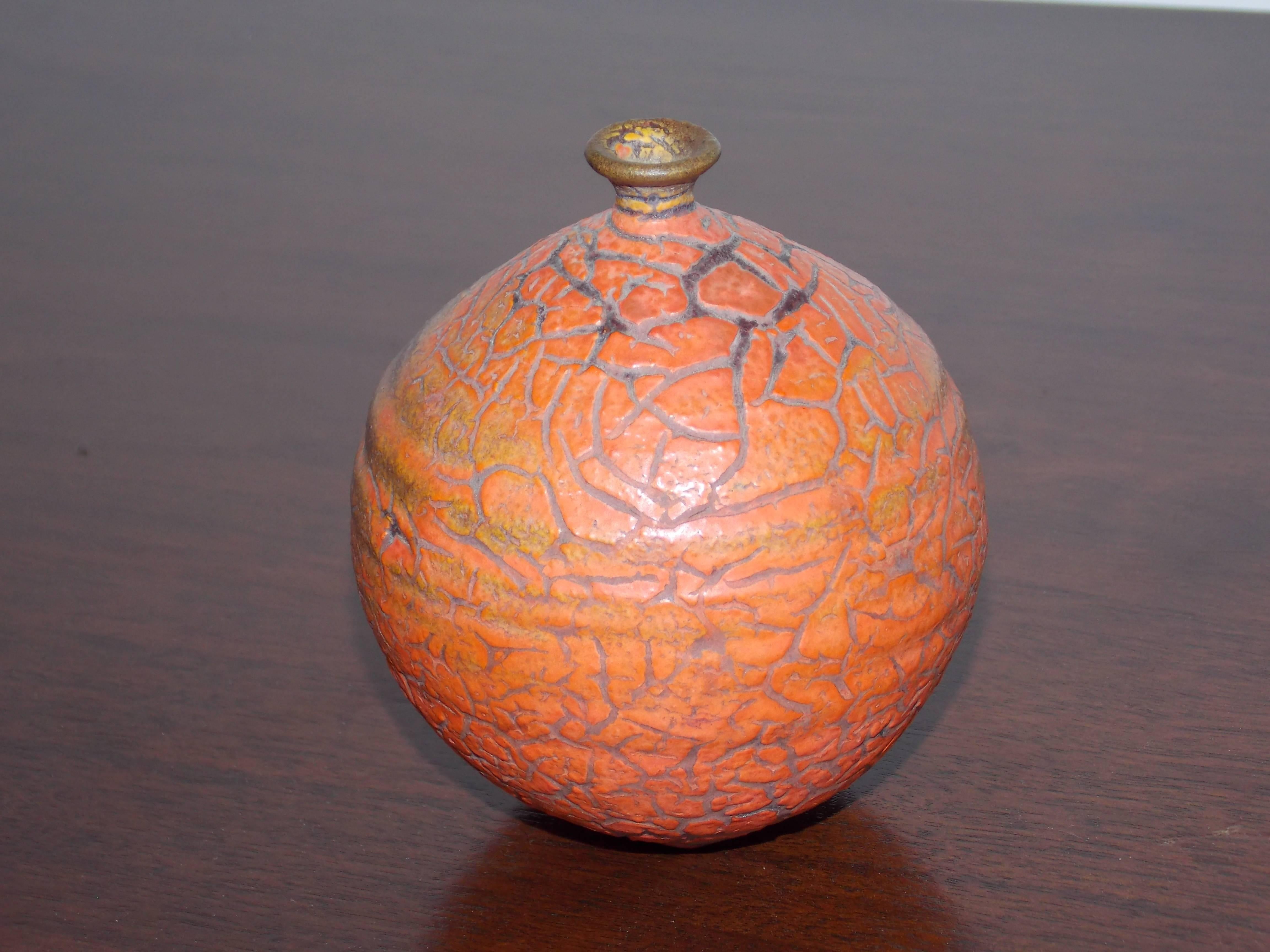 1925-2002.
Wheel thrown clay with a beautiful orange peel crackle glaze.
This piece is an exceptional example of Lane's signature style and technique.
It's one of a kind.
No chips, cracks or repairs. 
Add to a collection of these fine nuggets