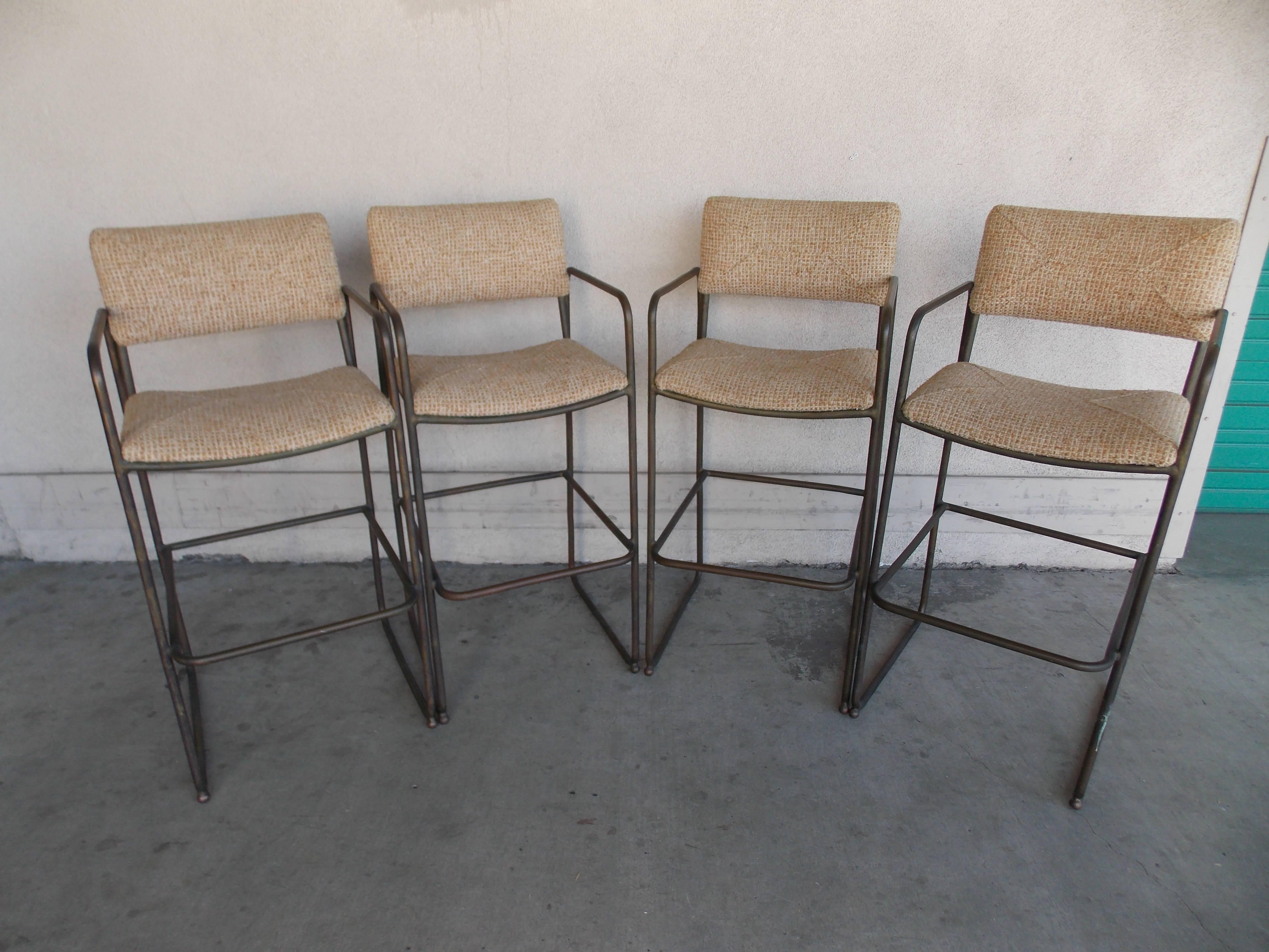 This is a rare set to come up for sale.
Only a few of these were made. 
The upholstered seating was probably a custom order. Because, these normally came in rope, which was inspired by Walter Lambs outdoor furniture, whom Mr. Stewart worked