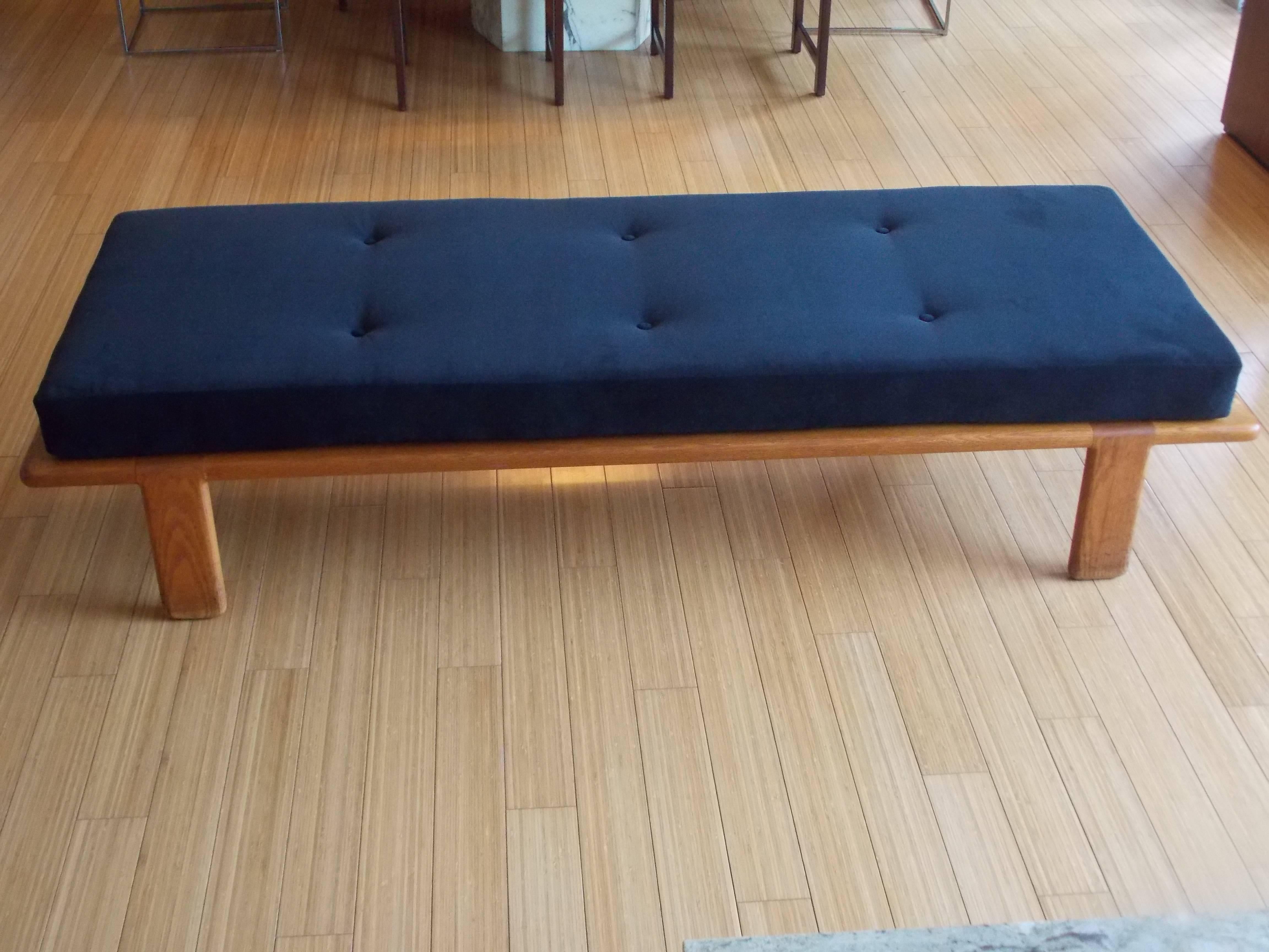 Gerald McCabe (1928-2010).
A nice and humble California modernist design.
Made of oak wood construction with nice joinery detail with new upholstered cushion.
The color of the fabric is almost black more like a midnight blue.
The wood has not