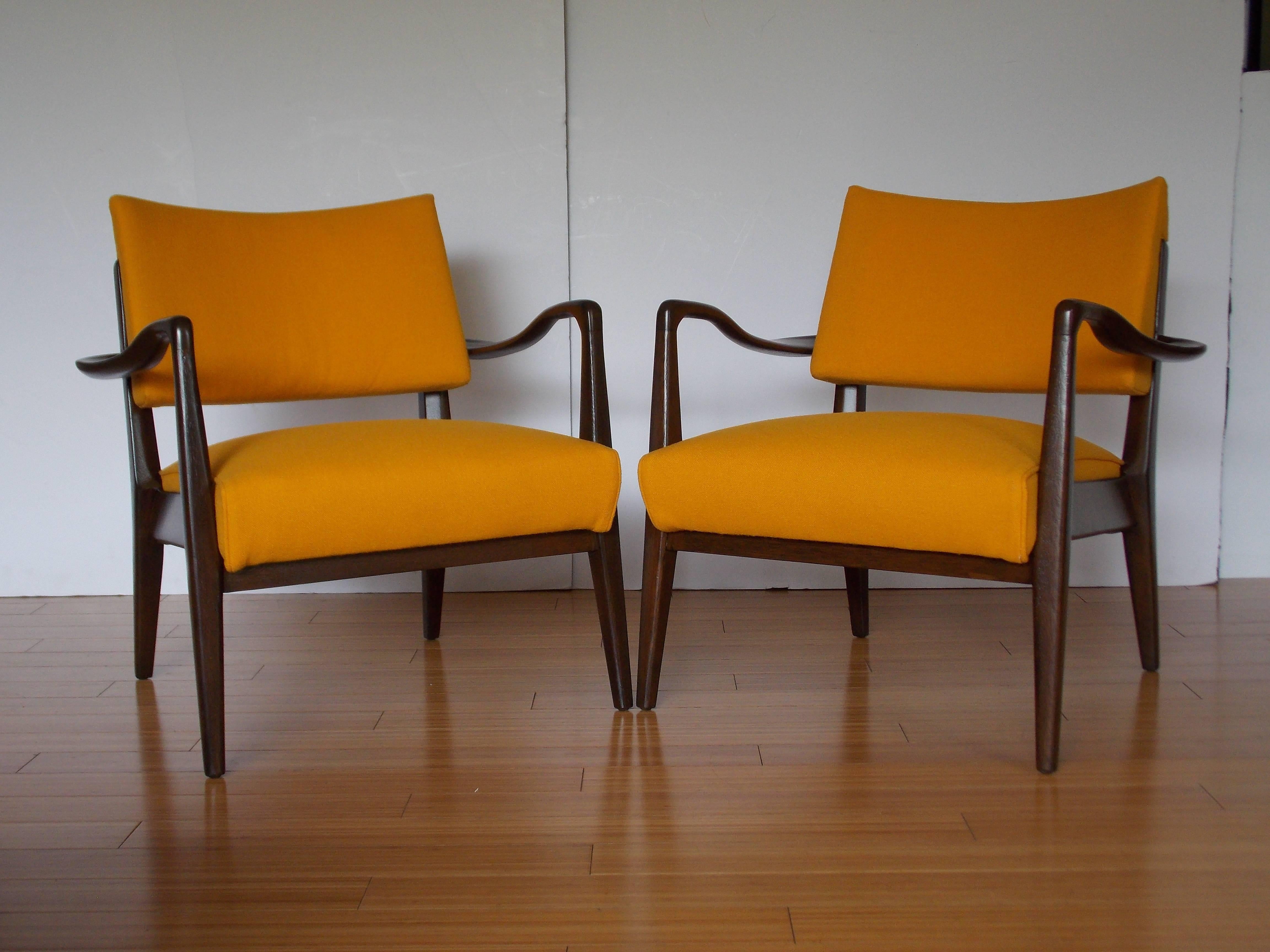 A handsome pair of California Designs
Made of mahogany wood construction and upholstery. 
They are sturdy, stout and comfy and will look great in any interior....

 