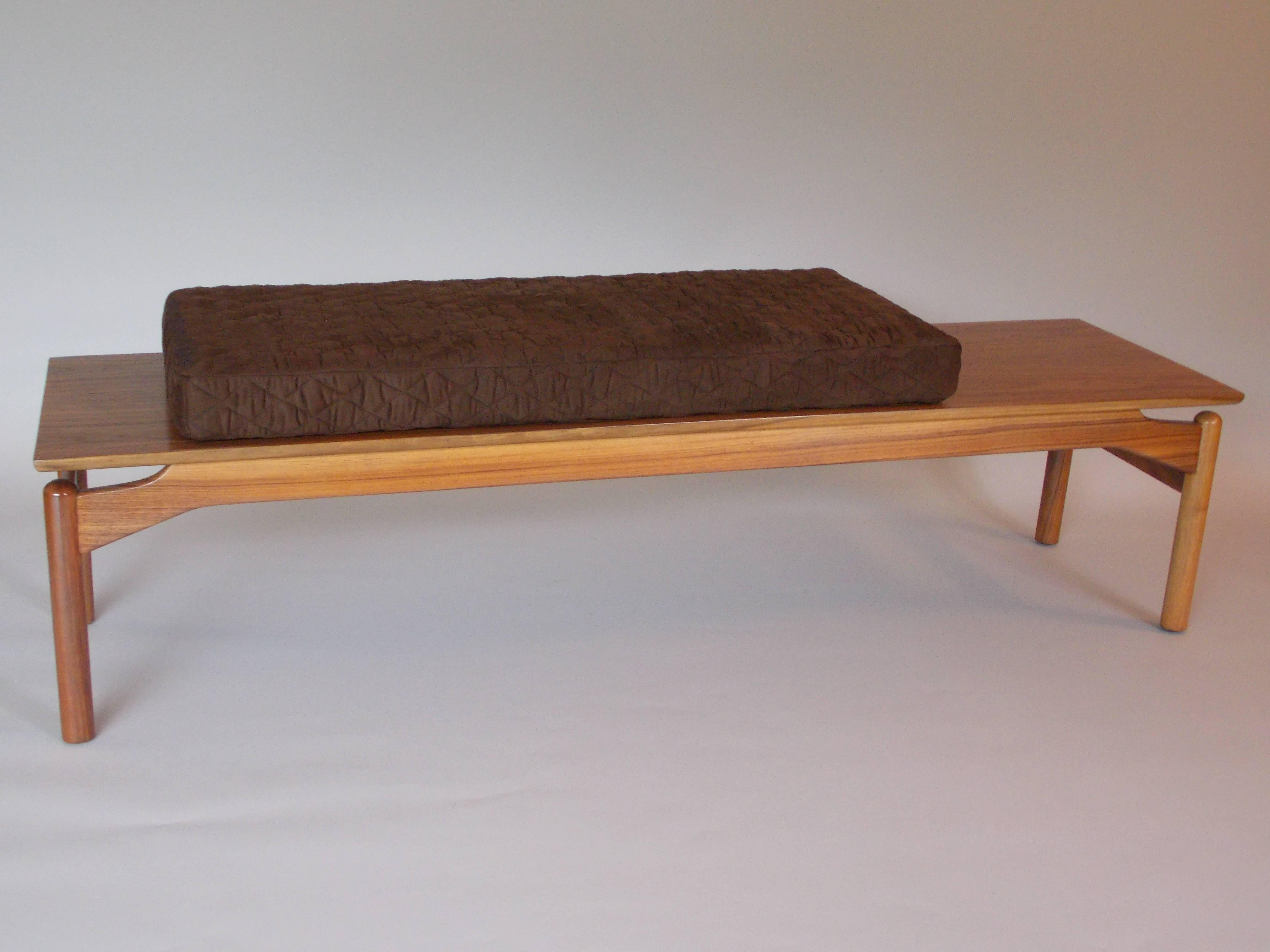 A great design.
Made of walnut with new upholstered cushion.
The wood has been restored with a natural finish.
It also has a nice grain pattern.
The cushion was made at a medium scale for occasional seating and positioning on the bench.
Great to use