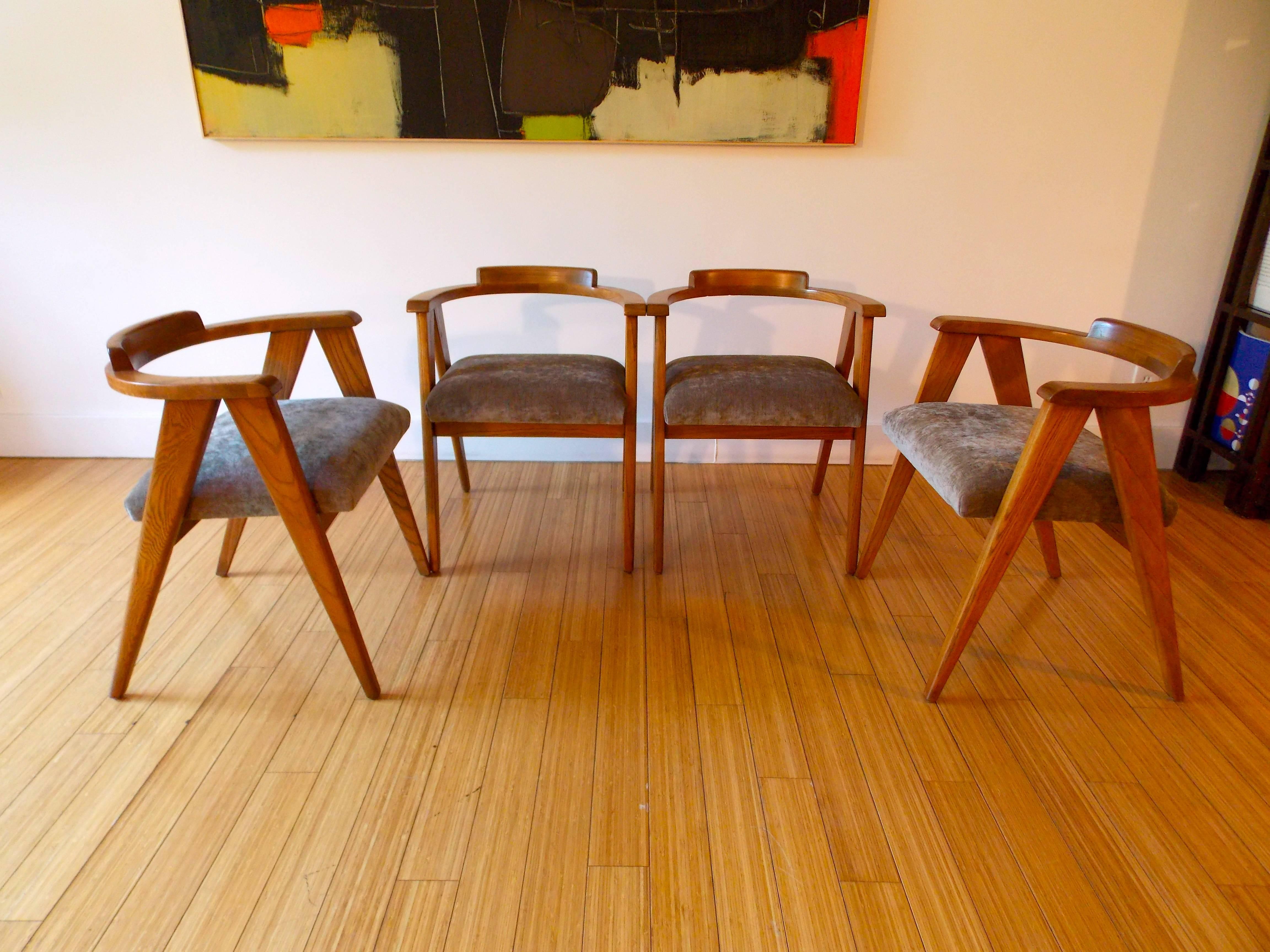 A nice set of four architectural designs.
Made of solid oak wood with beautiful natural grain and chic upholstery.
Solid and sturdy.
Great to use for dining or occasional seating.
 