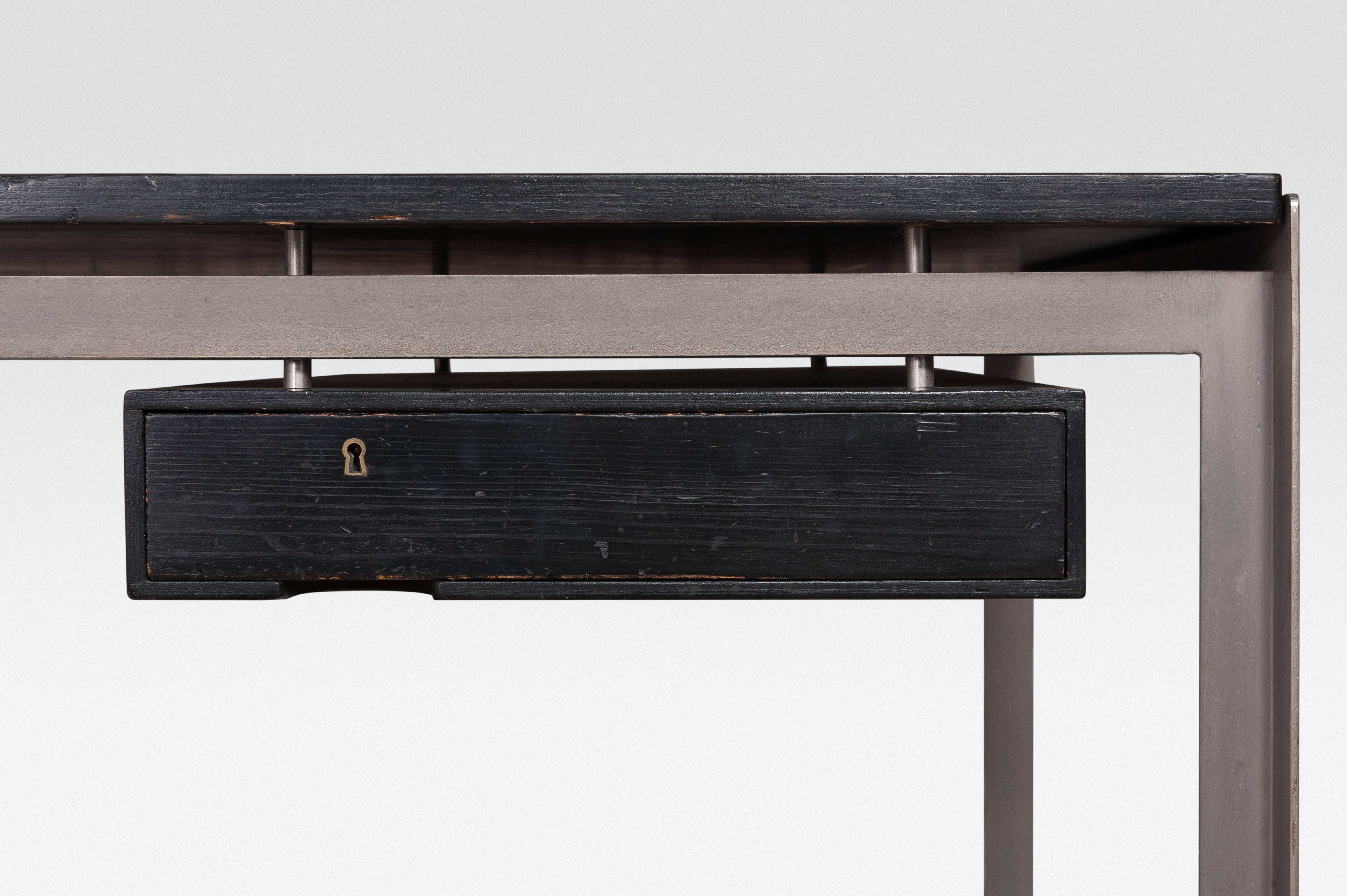 Manufactured by the cabinetmaker Rudolf Rasmussen, 1955.
Painted Oregon pine top and steel base.
  