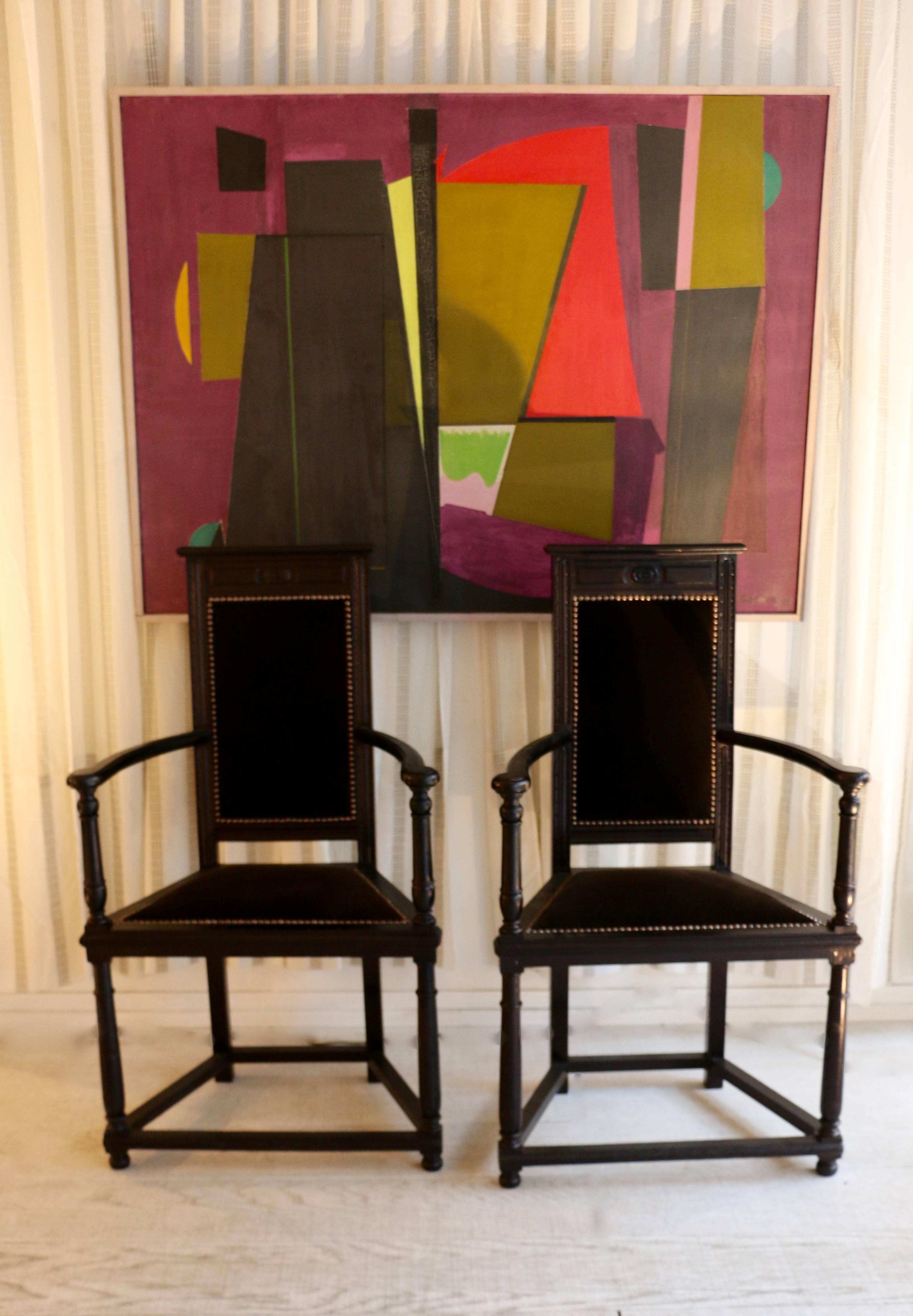 Pair of black wooden armchairs. Late 19th century, Europe. 
Reupholster seats and and seatbacks.
