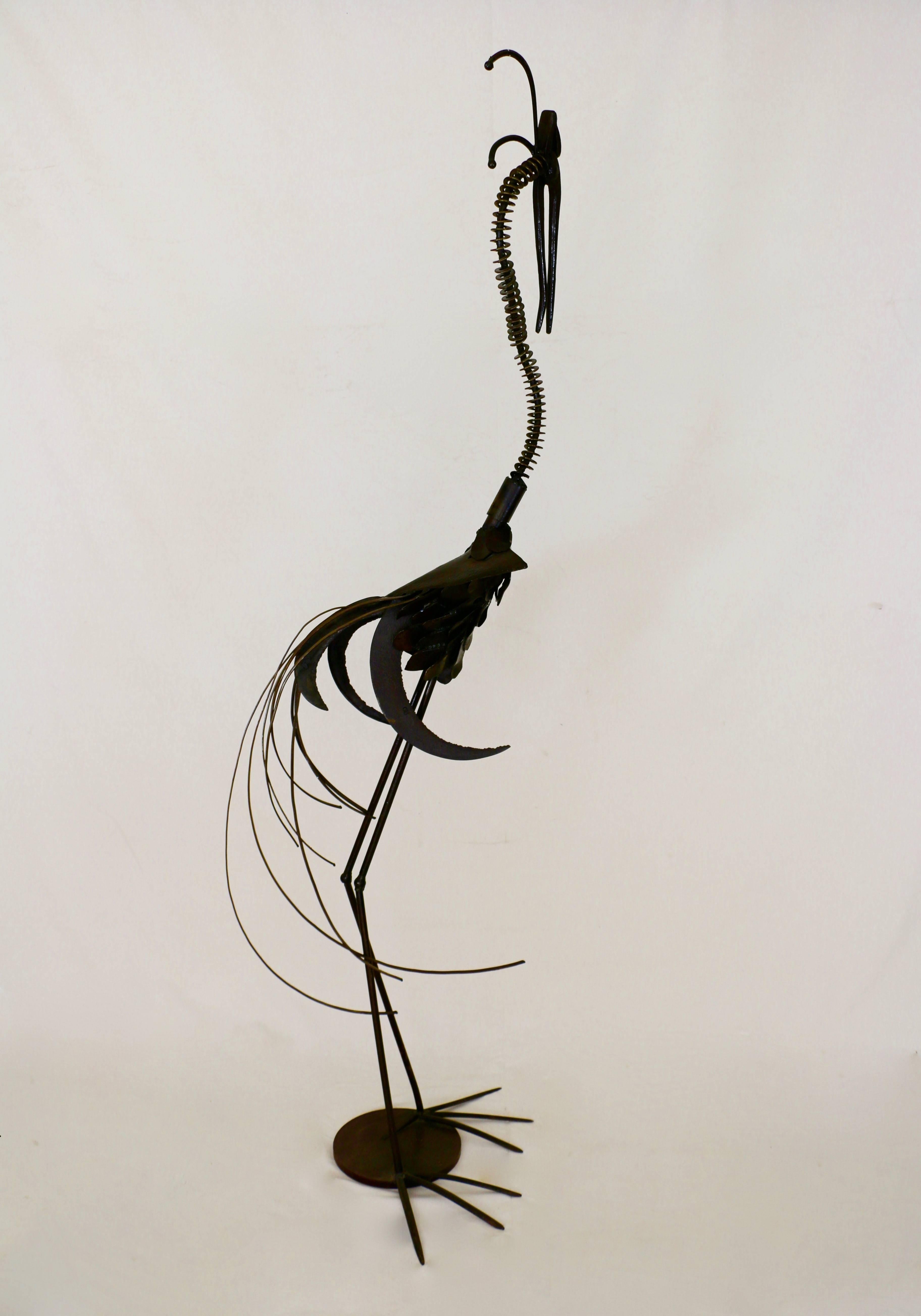 Late 20th Century 1970s Marabout Sculpture in Wrought Iron and Tools