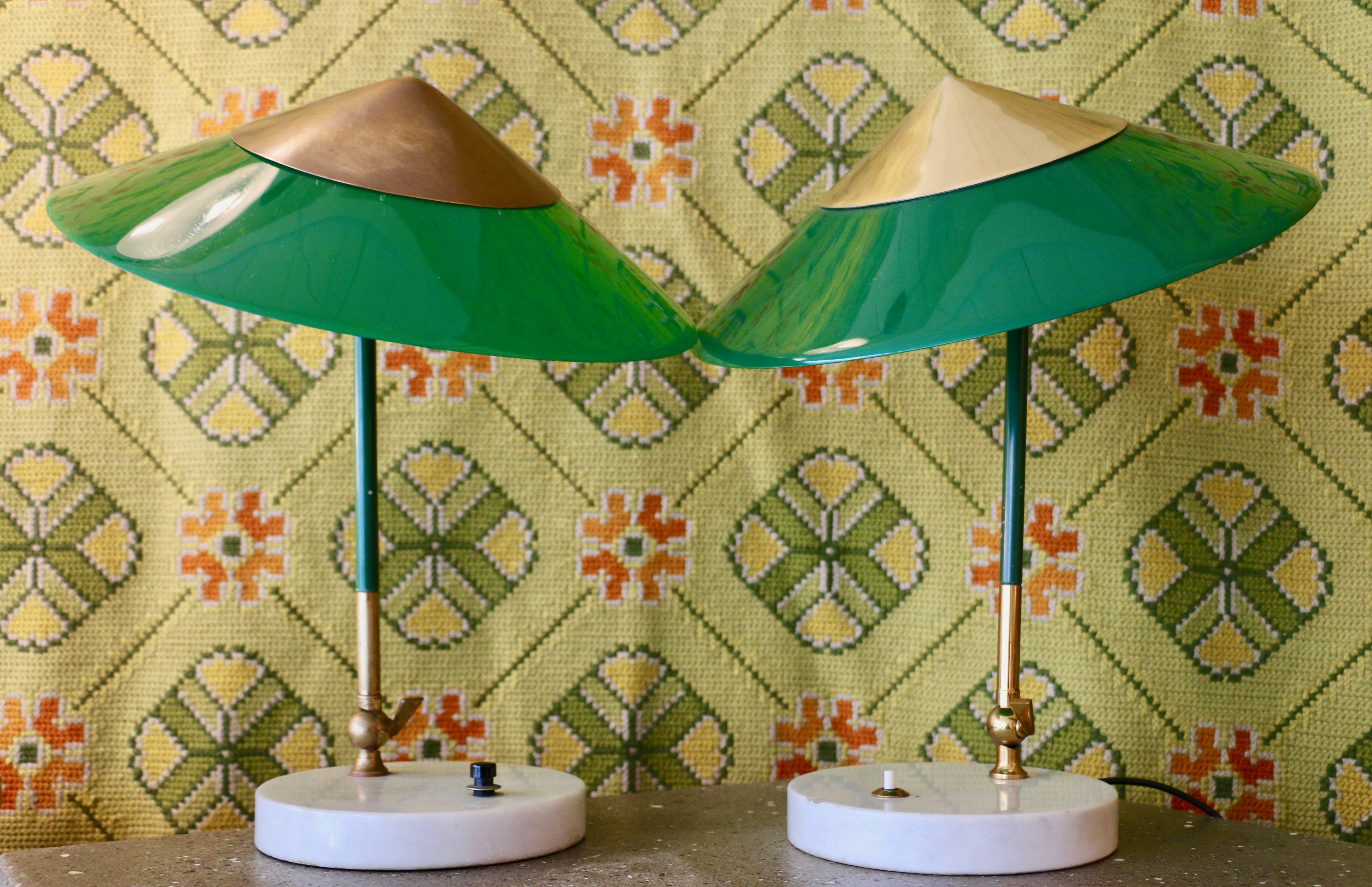 Pair of Stilux articulated lamps, Italy, 1950s. Shades in green Perspex and brass. Base in white marble.