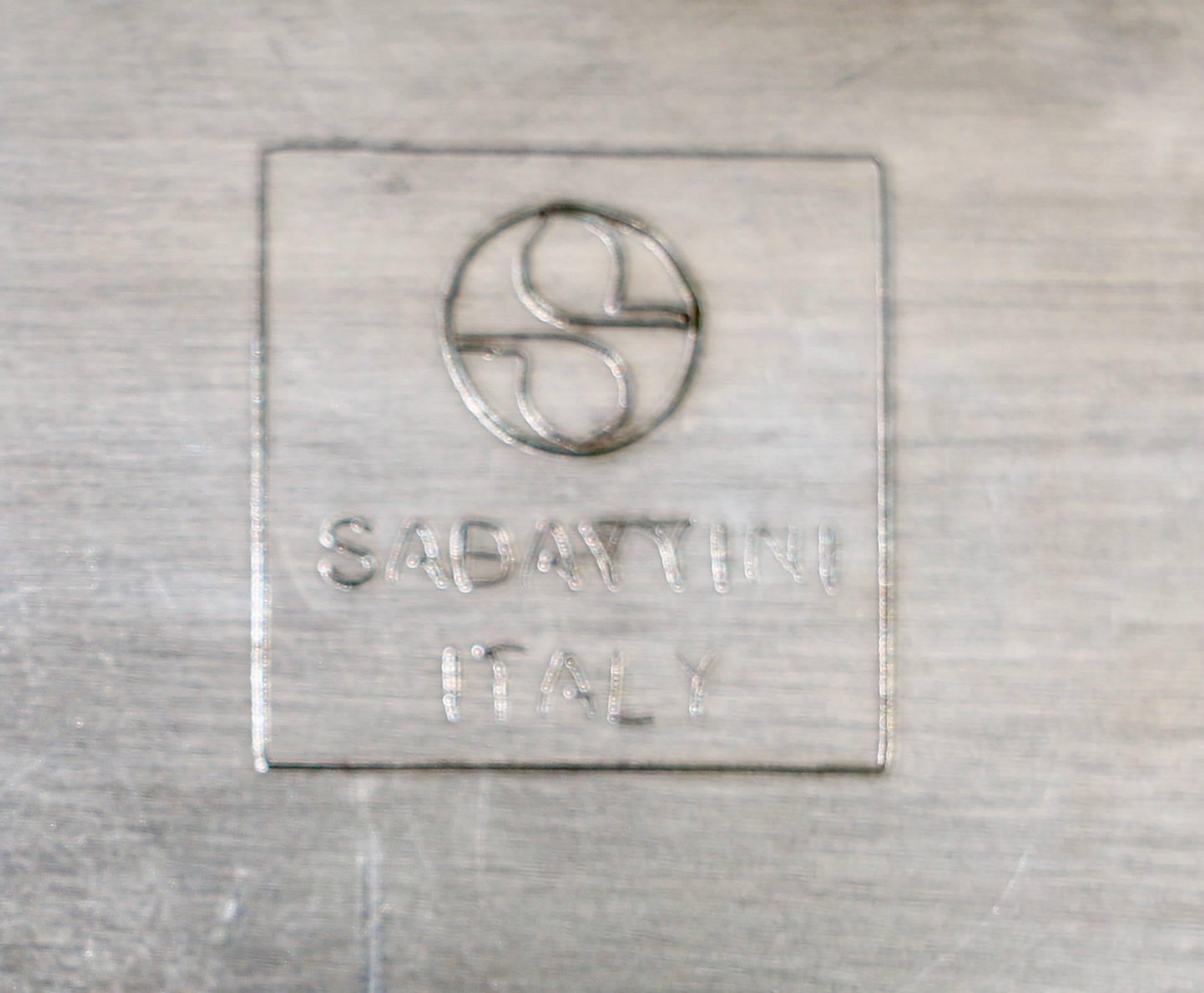 Italy, 2001, Sabattini. Palma Servitor model. Silvered metal plate with a leave shape.