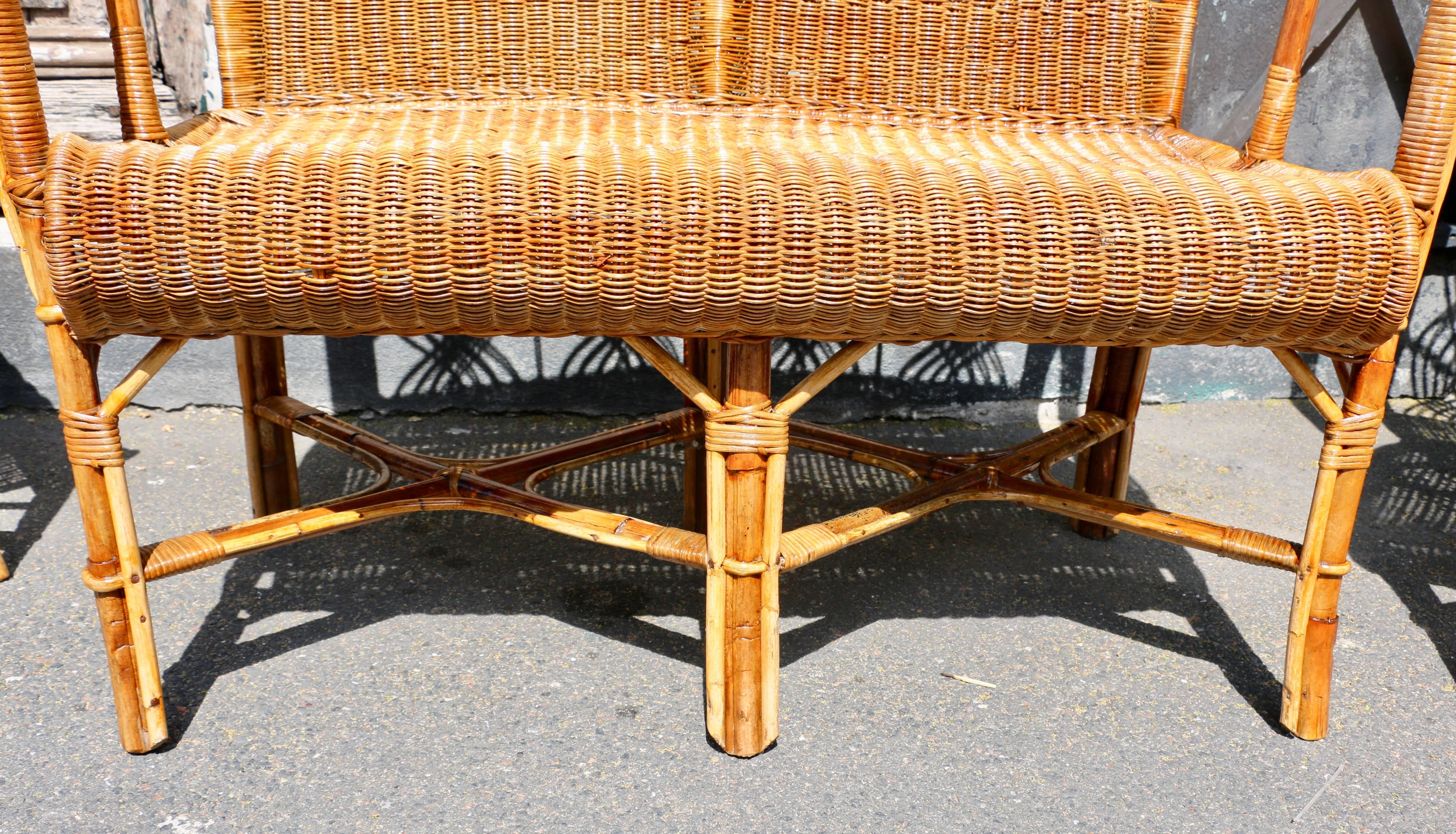 Mid-20th Century 1960s A small two seat bench in Rattan