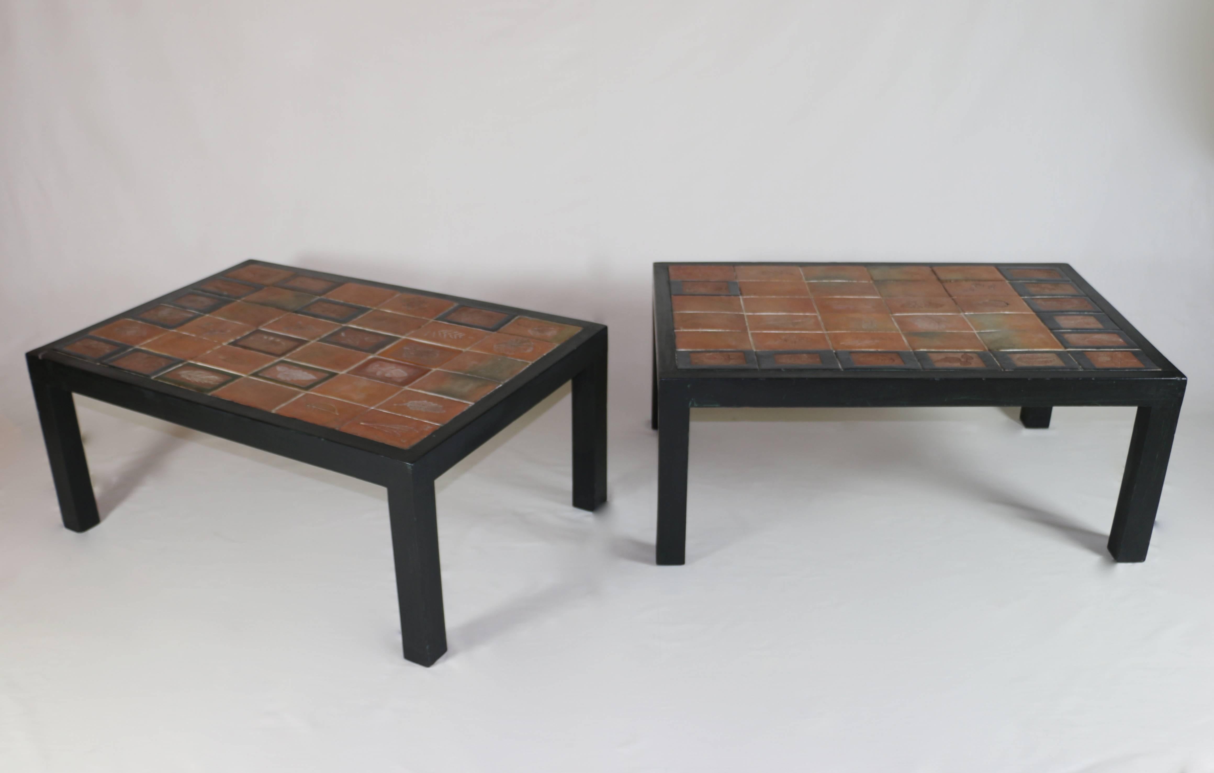Pair of coffee table by Roger Capron. 